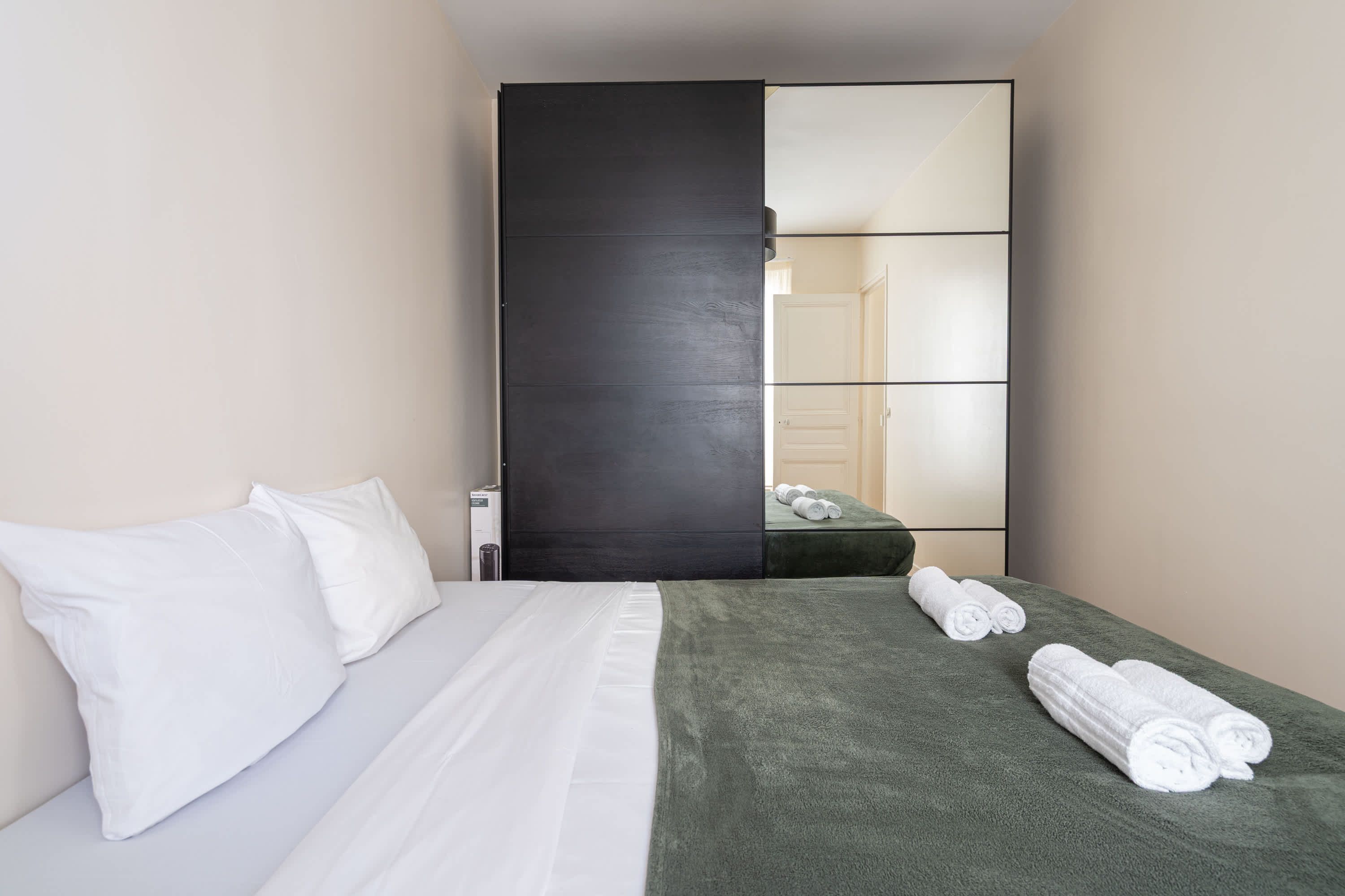 Elegant Parisian apartments with bright living areas, cozy bedrooms, and fully equipped kitchens.