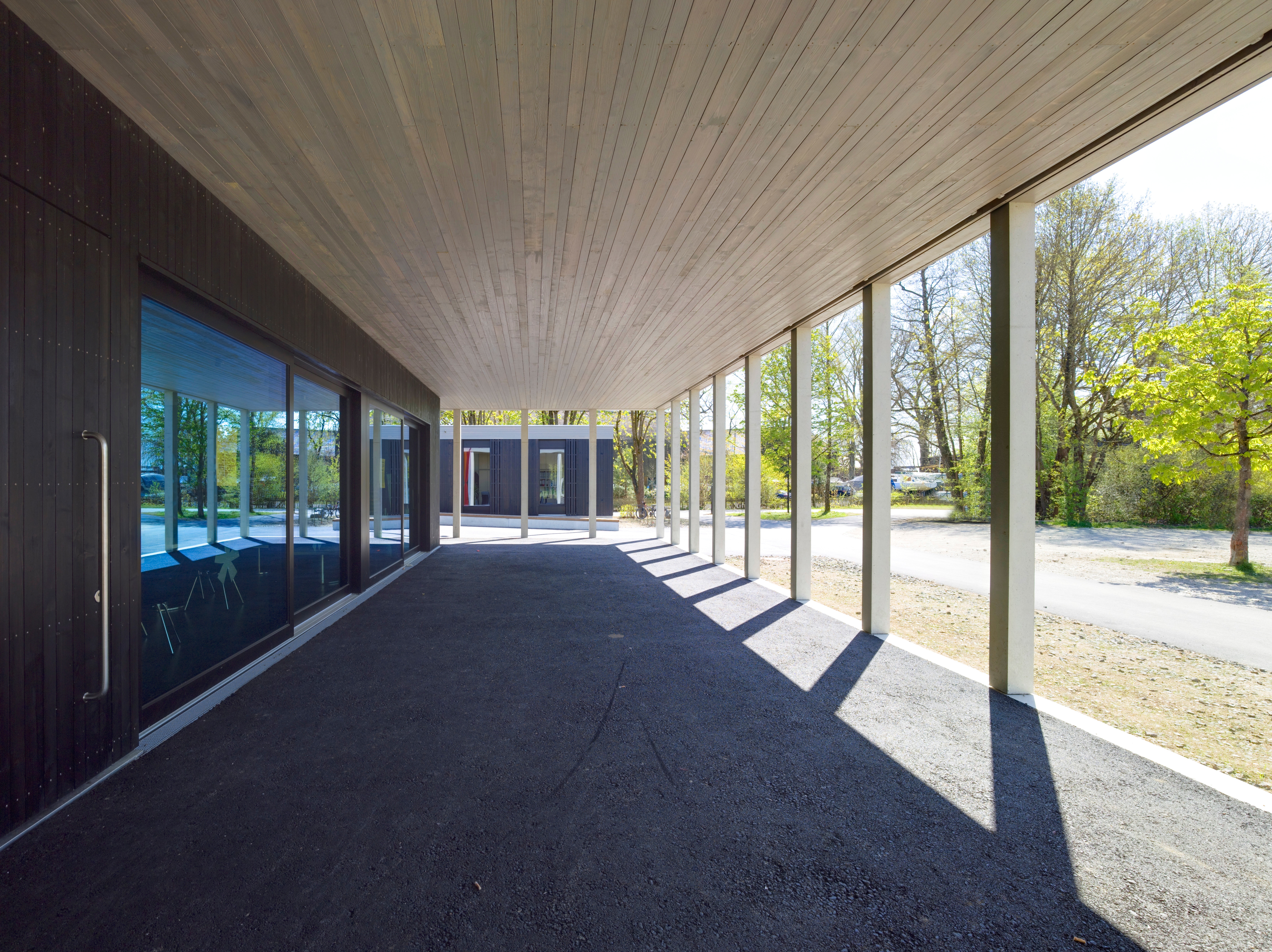 Goetz Castorph Lehmann Tabillion Architektur Städtebau München Starnberg Jugendzentrum Neubau Nepomuk Kamin Turnhalle Sporthalle Laterne