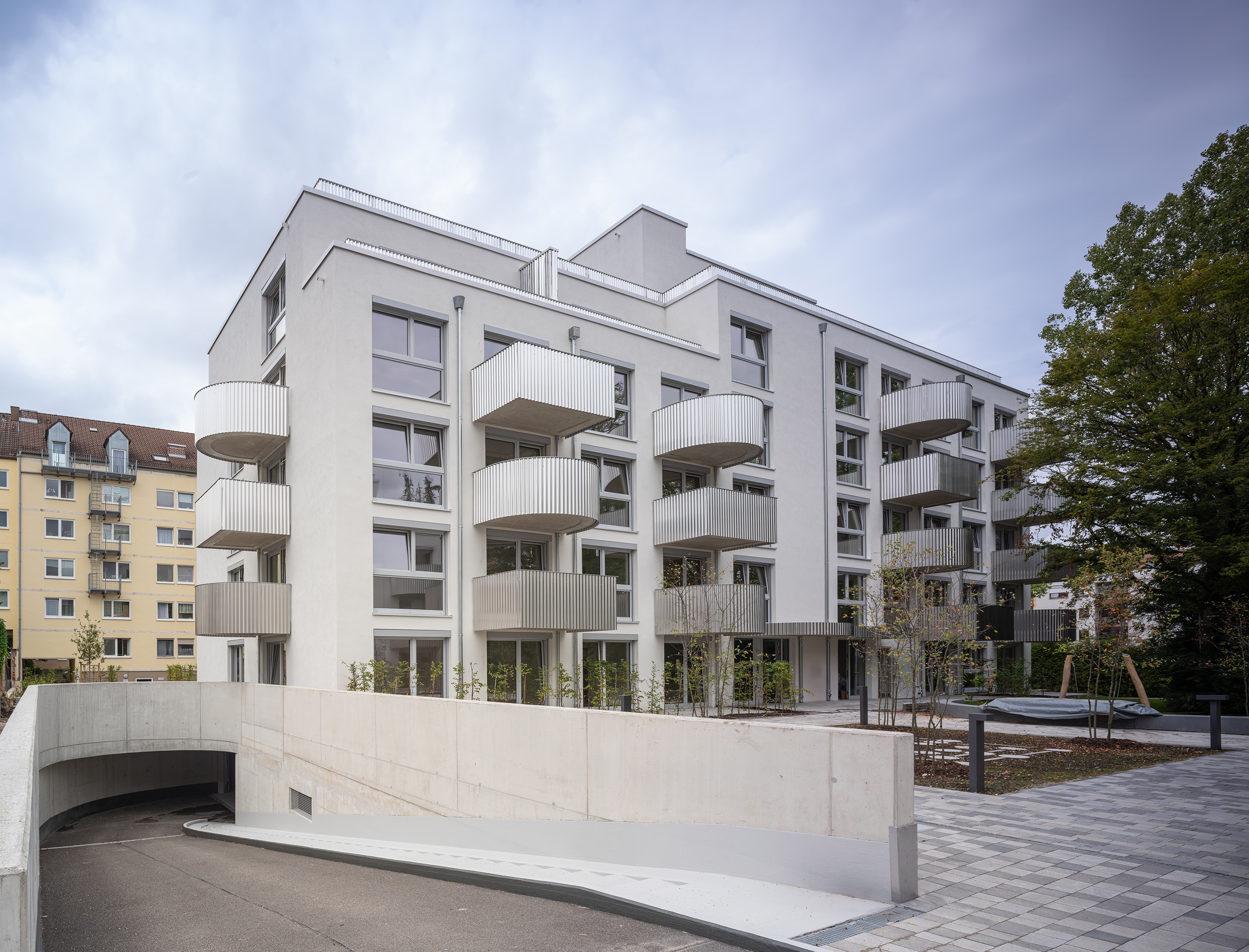 LTC LTundC Lehmann Tabillion Castorph Architektur Stadtplanung Gesellschaft Sendling Neubau Mietwohnungen Wohnungen Mehrfamilienhaus Marbachstraße Architekten Wellblech Balkone Eisspeicher rund eckig