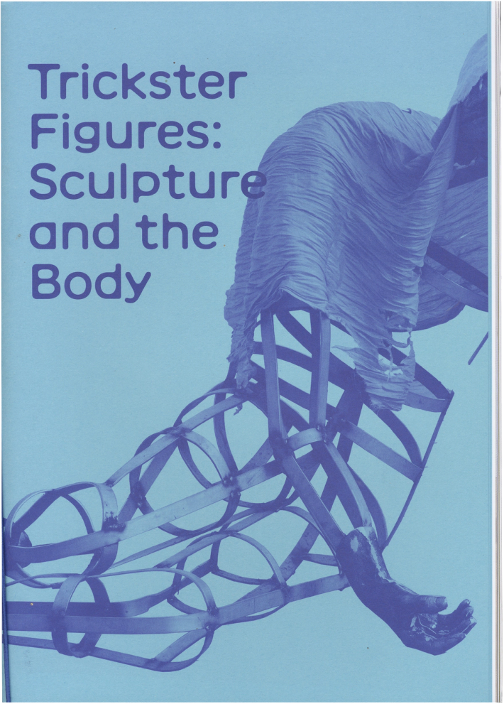 Book cover for "Trickster Figures: Sculpture and the Body" featuring a blue and purple abstract sculpture with a skeletal frame, draped fabric, and a realistic hand.