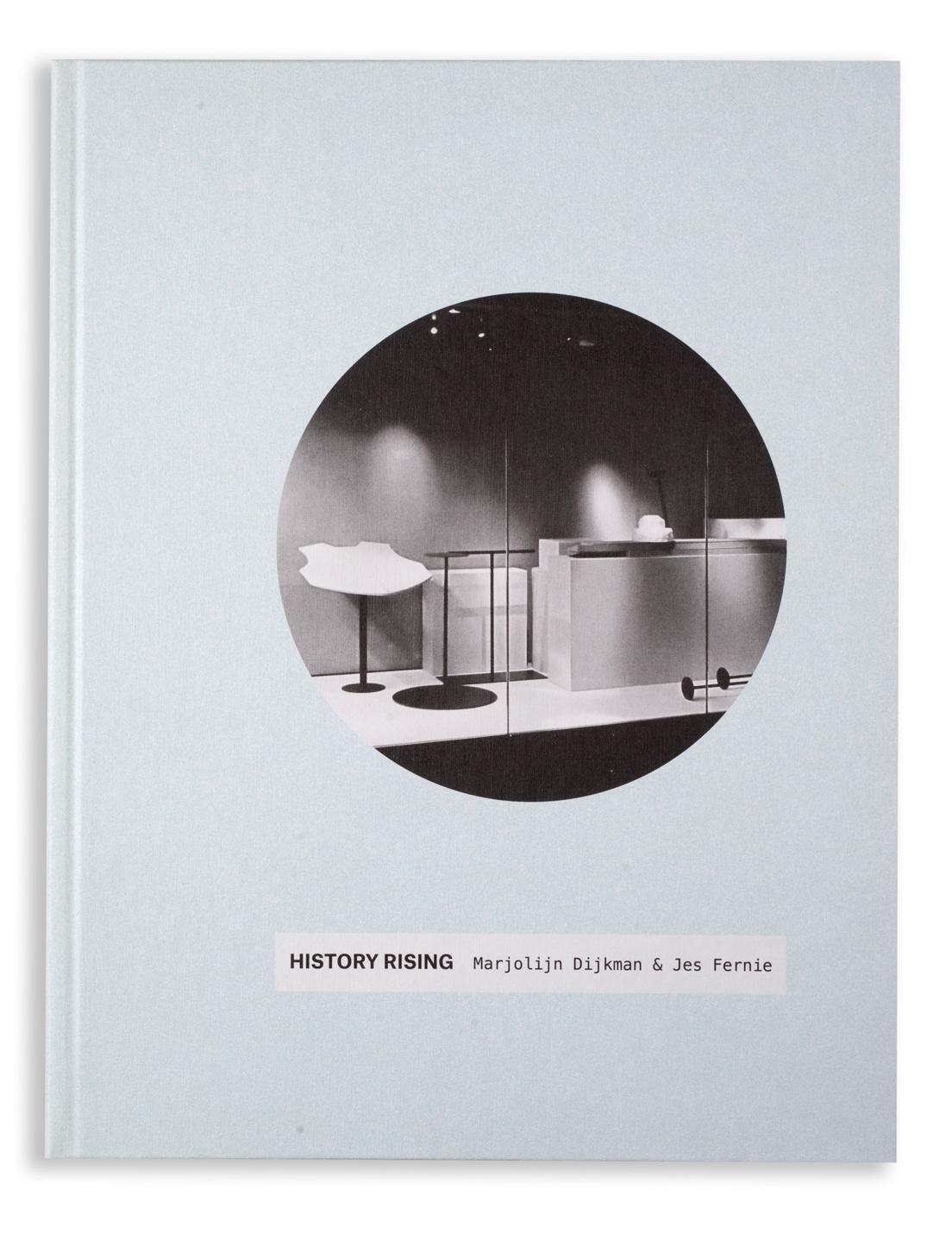 Light blue book titled "HISTORY RISING" by Marjolijn Dijkman & Jes Fernie, featuring a circular black and white image of a minimalist interior on the cover.