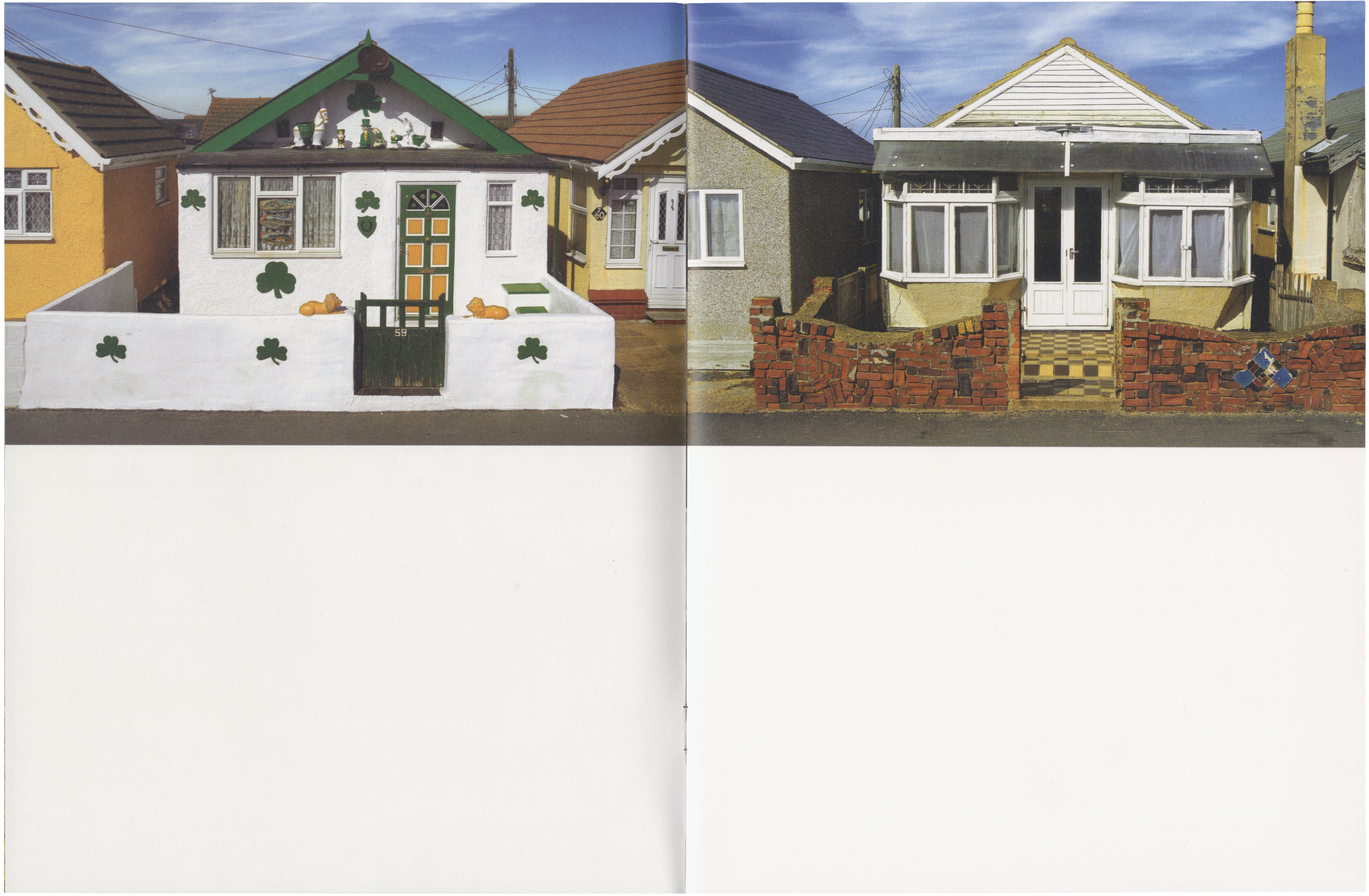 Two bungalows side-by-side. The left house is white with a green roof, door, and gate, decorated with green shamrocks and orange pumpkin shapes. The right house is beige with a white bay window and a red brick wall.