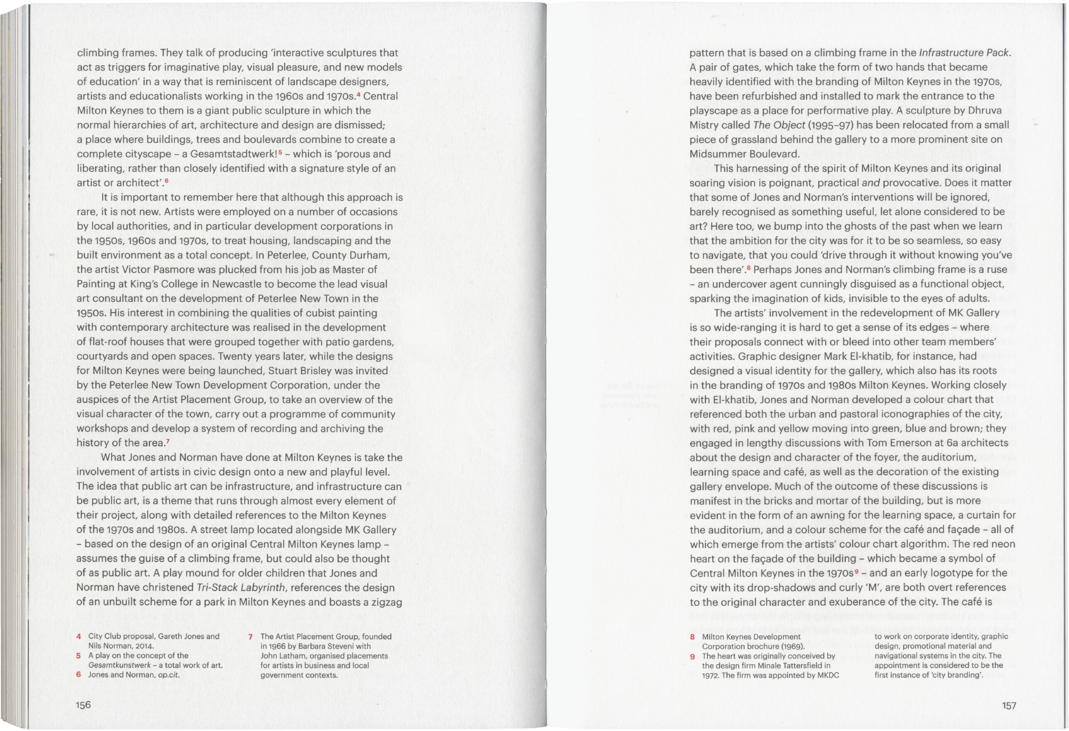 Two open pages of a book filled with columns of text.