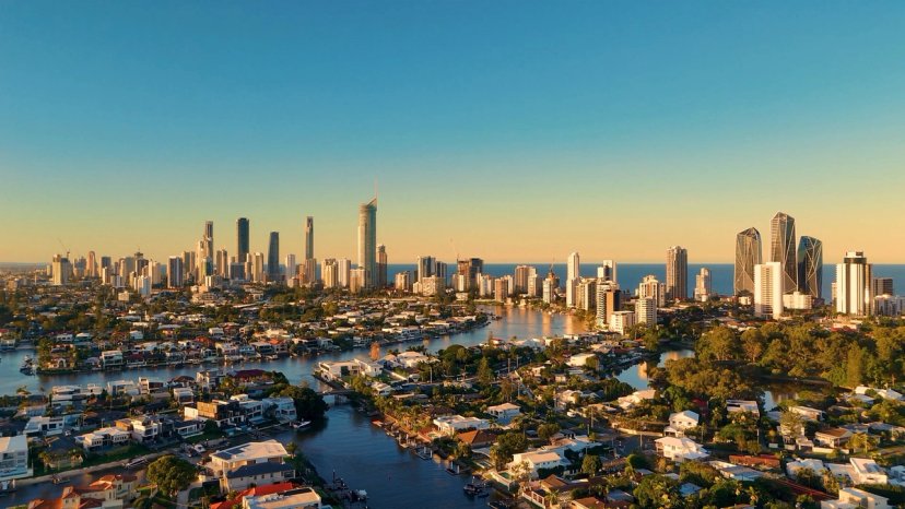 Deretan rumah pantai kayu warna-warni Brighton Bathing Boxes di tepi pasir Melbourne