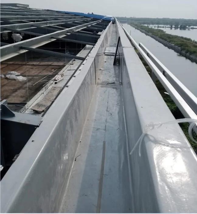 Dura LITE® FRP gutter installed along an industrial roof