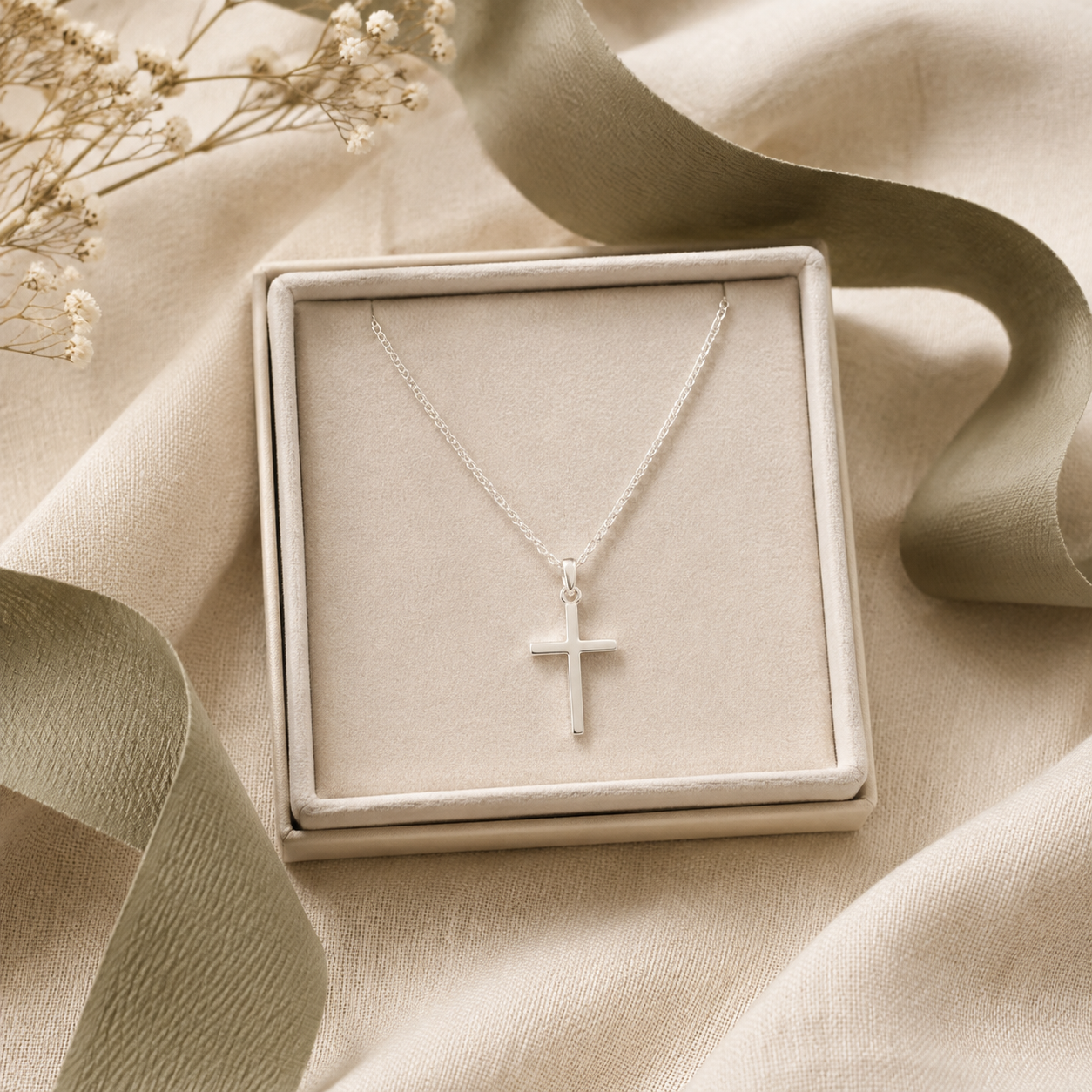 Sterling-silver cross necklace presented in a gift box