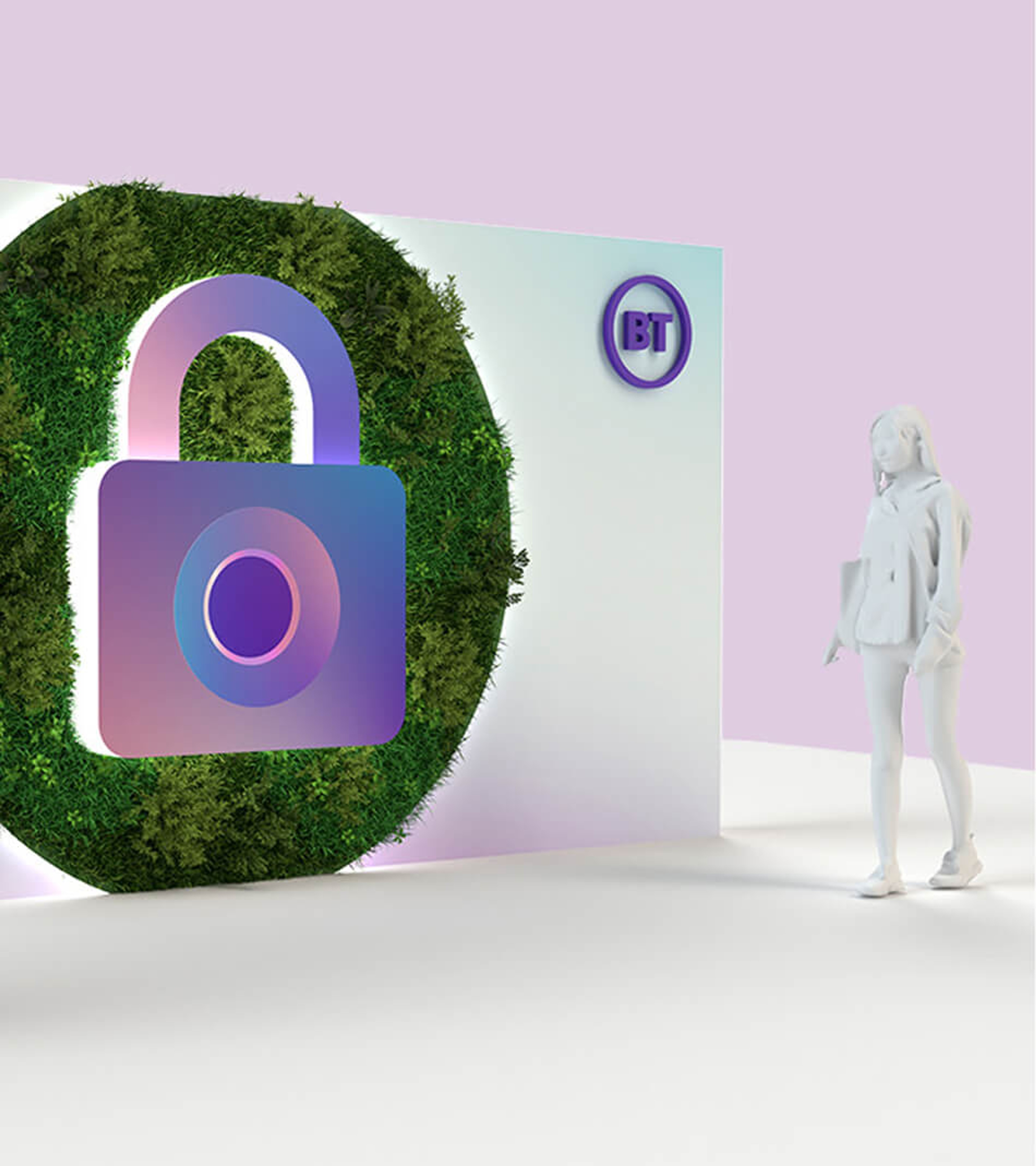 A white backdrop featuring a large padlock graphic mounted on a circular green plant wall next to a BT logo and a white mannequin