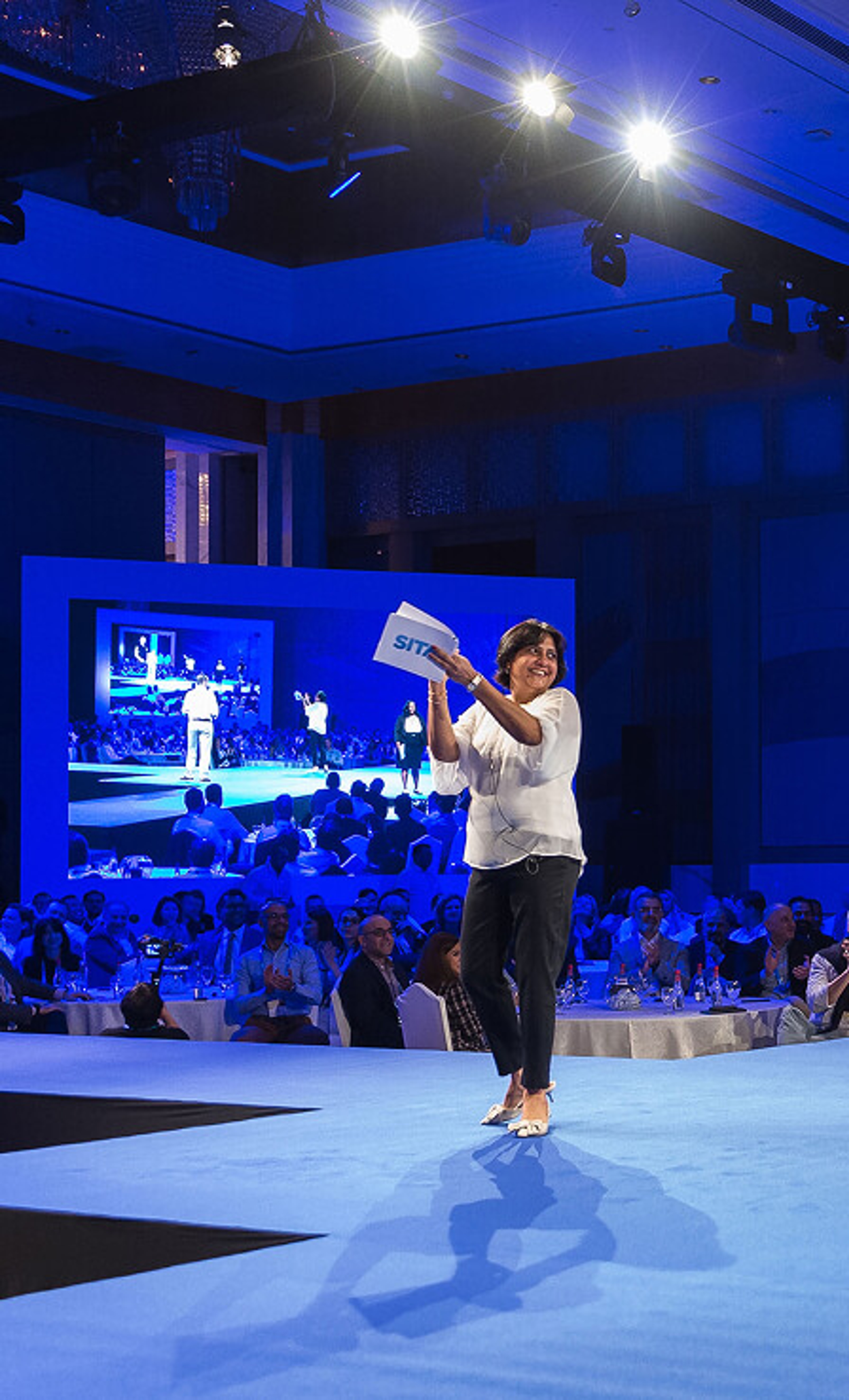 Person on stage at SITA conference