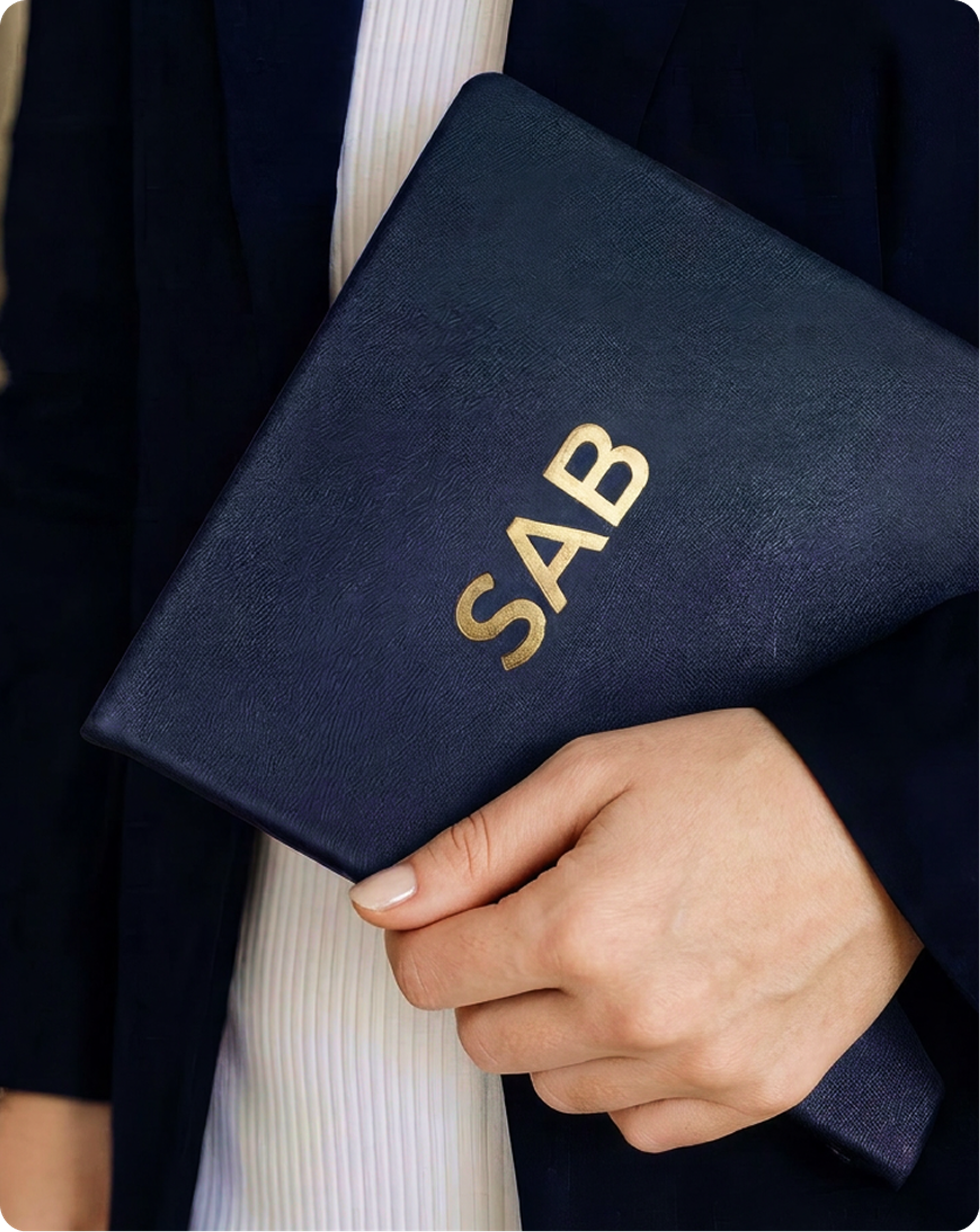 Guest holding a branded SAB Security Advisory Board notebook