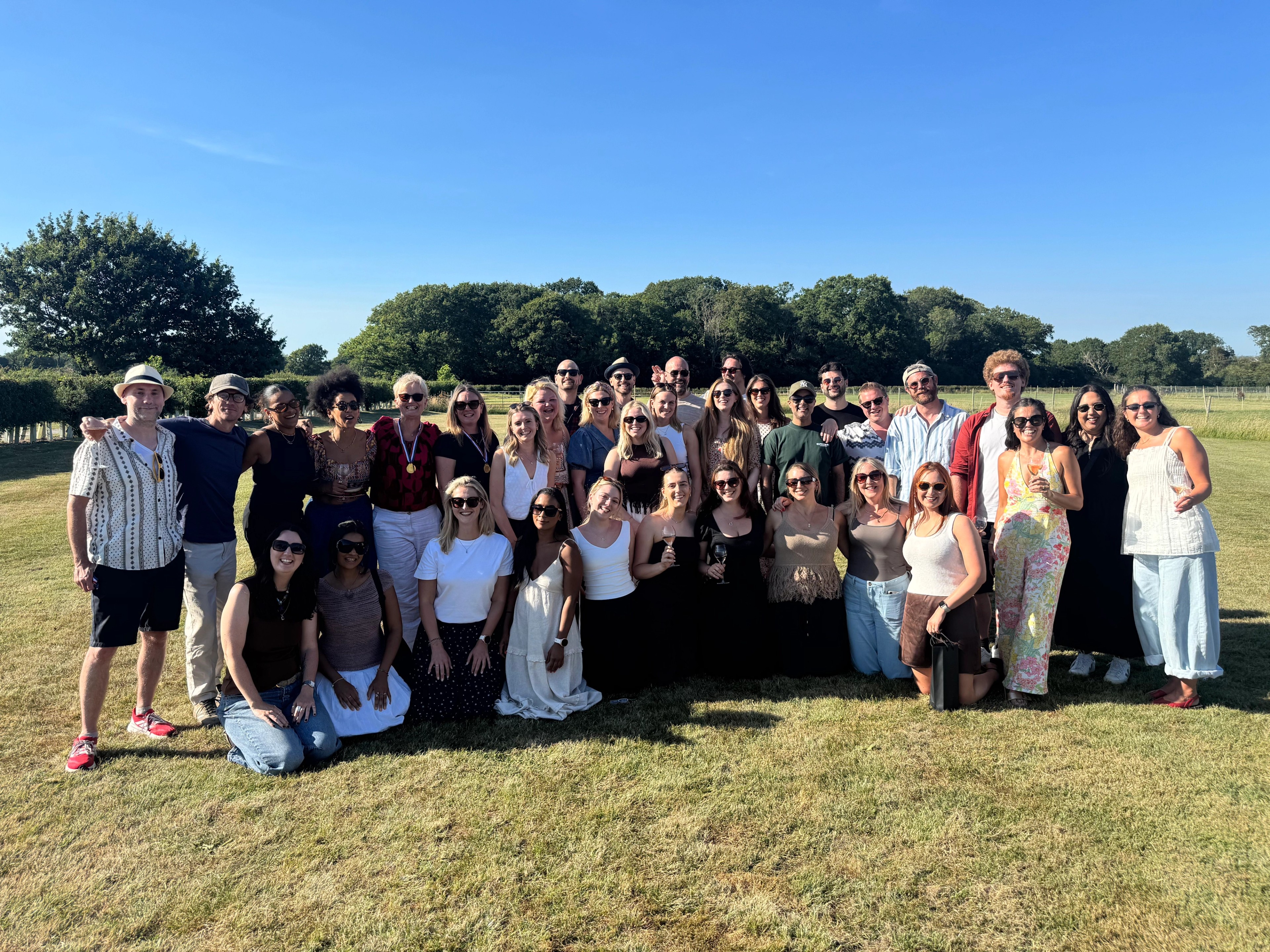 Yellow Fish Staff photo in the sunshine at a vineyard