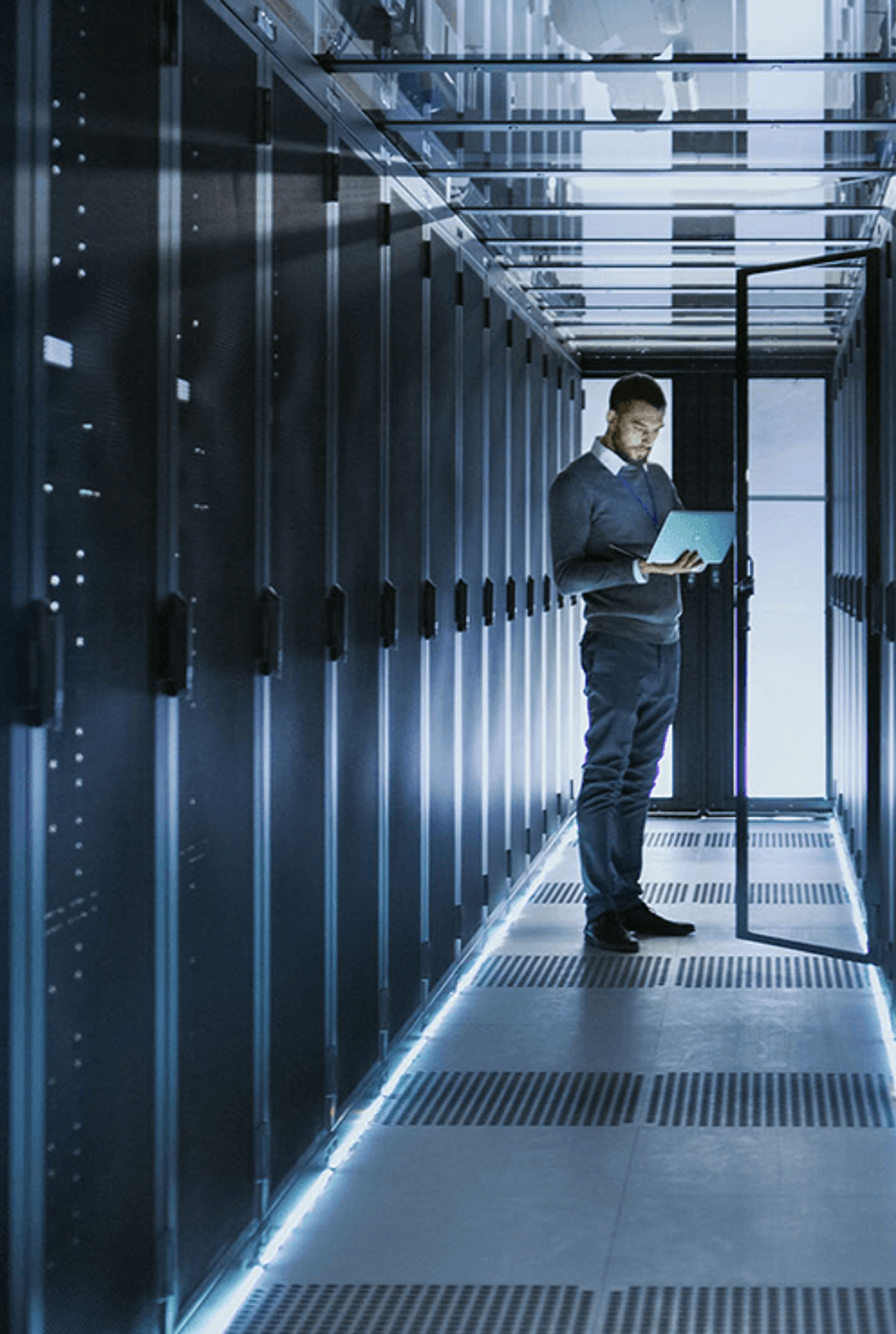 Engineer working in a modern data centre