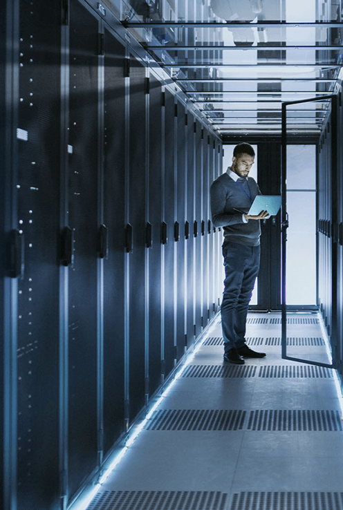 Engineer working in a modern data centre
