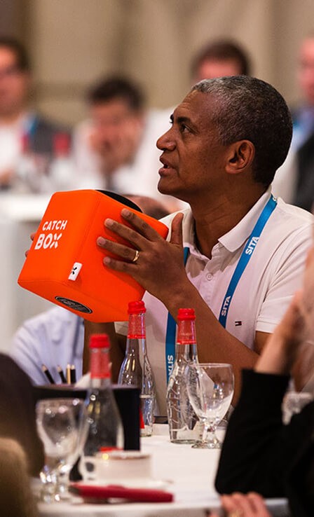 SITA attendee holding the 'catch box'