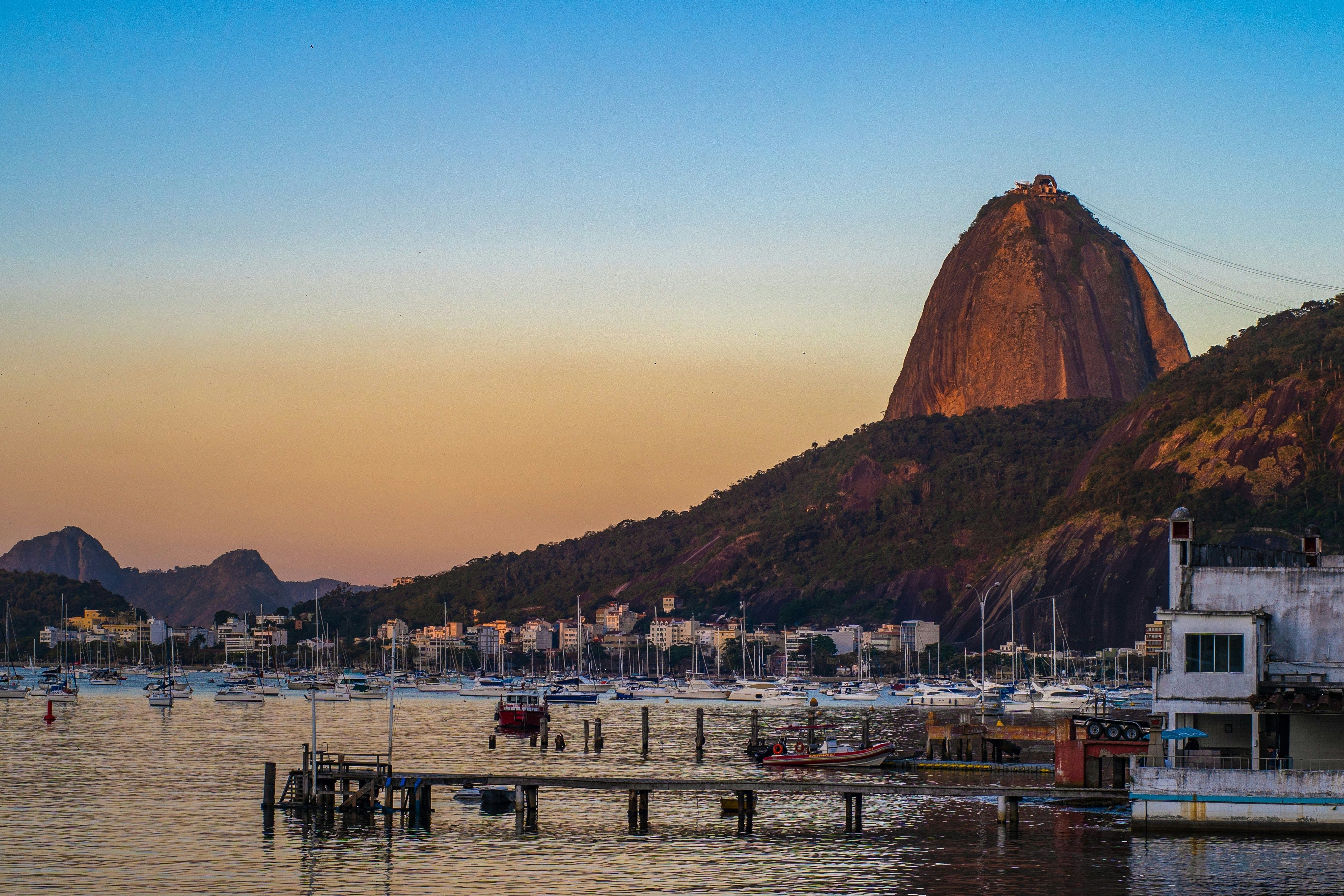 view of Rio De Janeiro over the water at sunset