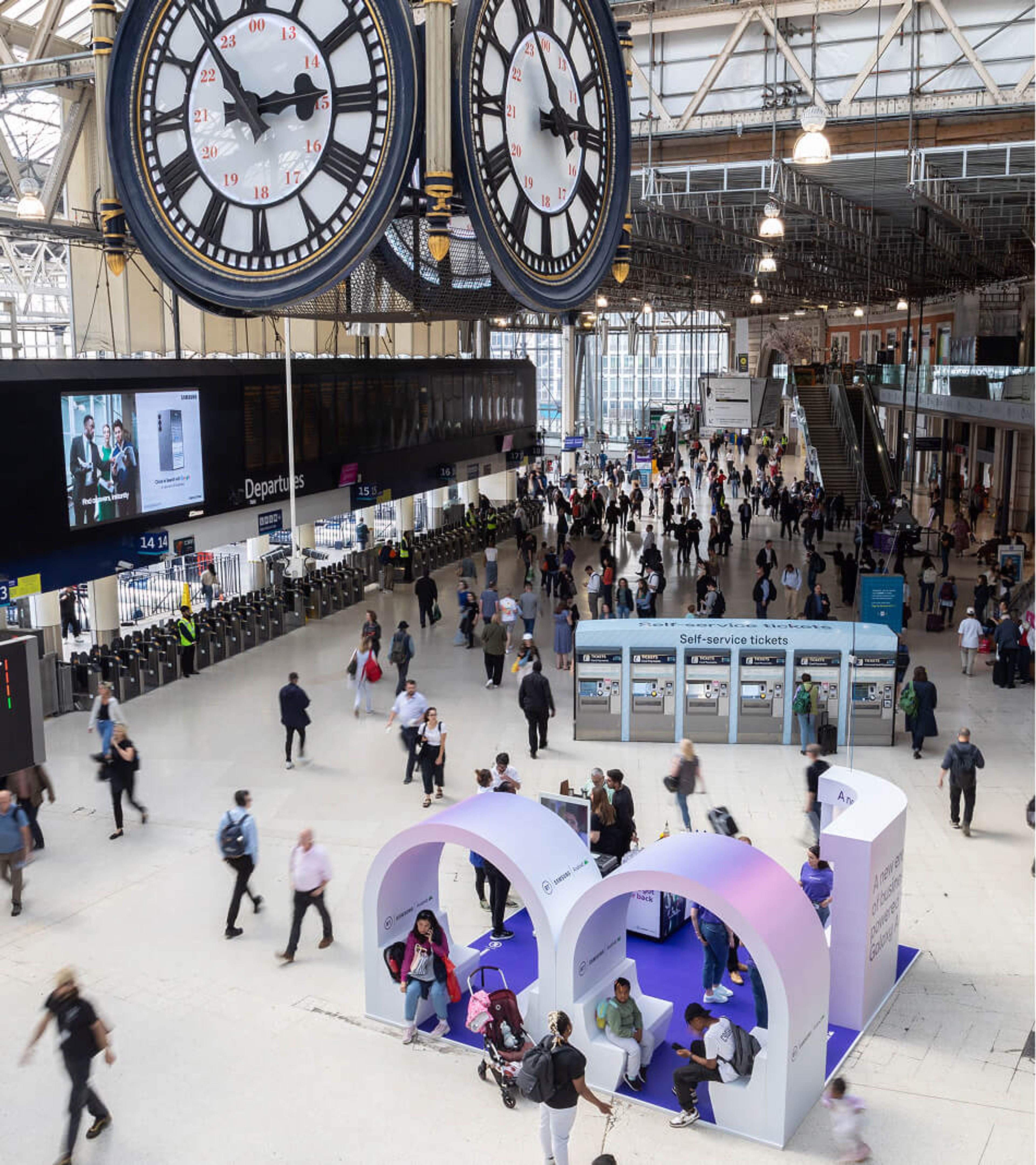 BT and Samsung experiential activation in London Waterloo station, featuring a branded pop-up space promoting Galaxy AI to passing commuters.