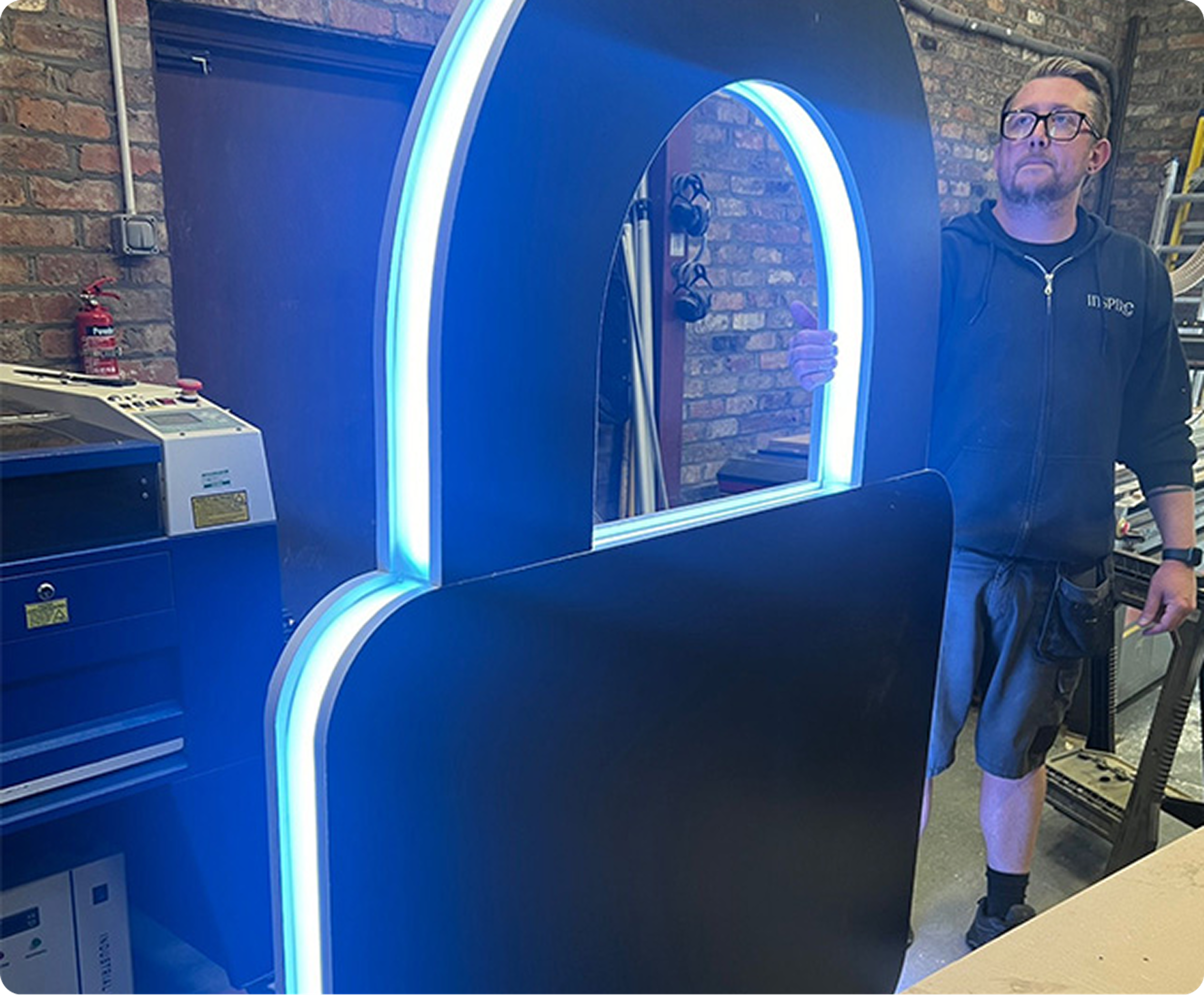 Illuminated padlock prop being prepared for the BT Security Advisory Board event