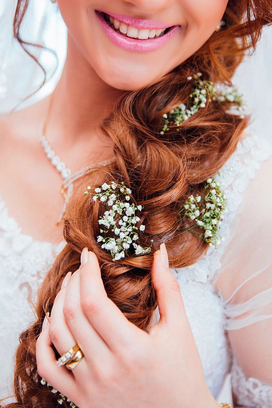 Portrait of Elena Ruiz with flowers braided into her hair