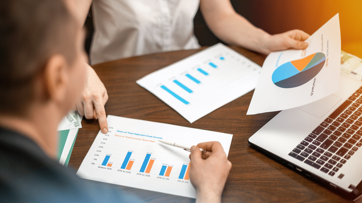 office-staff-checking-anayltical-data