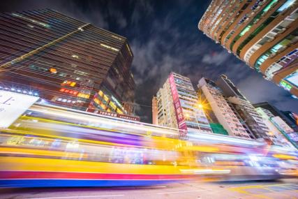 Speeding cars at night in Hong Kong (Photo by Jimmy Chan: https://www.pexels.com/photo/time-lapse-photography-of-road-near-buildings-2552595/)