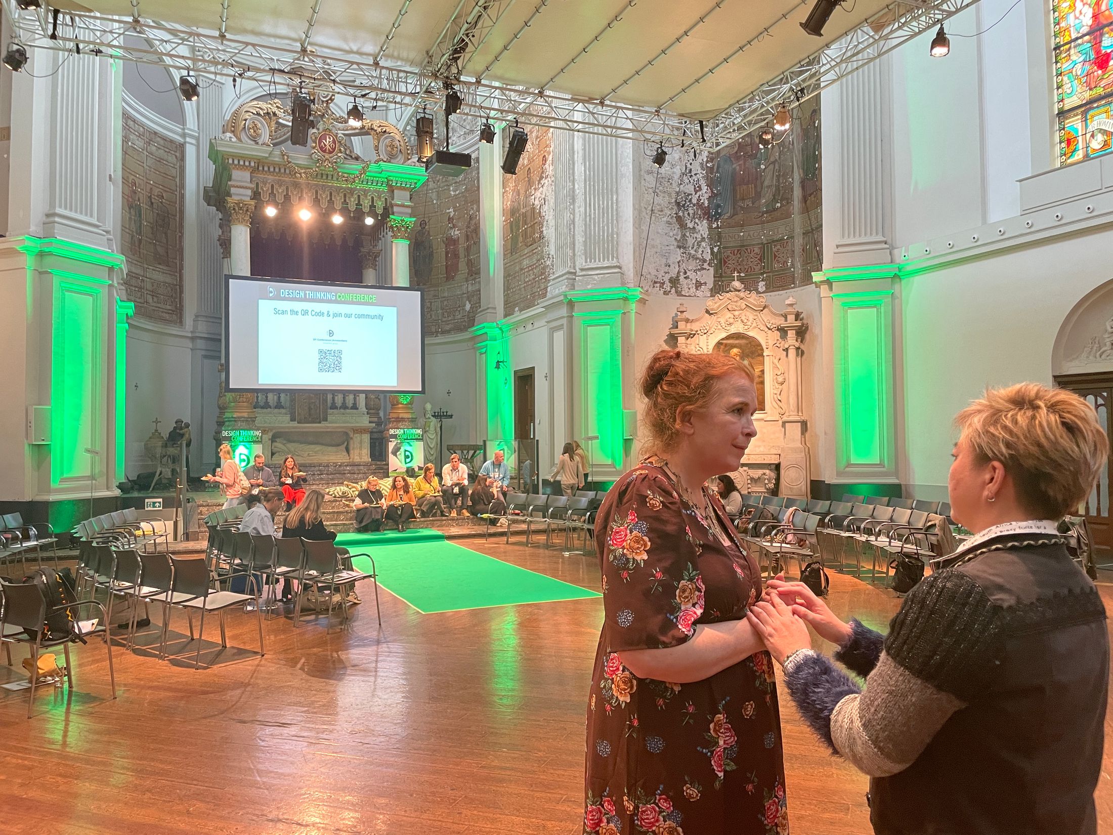 Johanna in conversation with an attendee at the conference