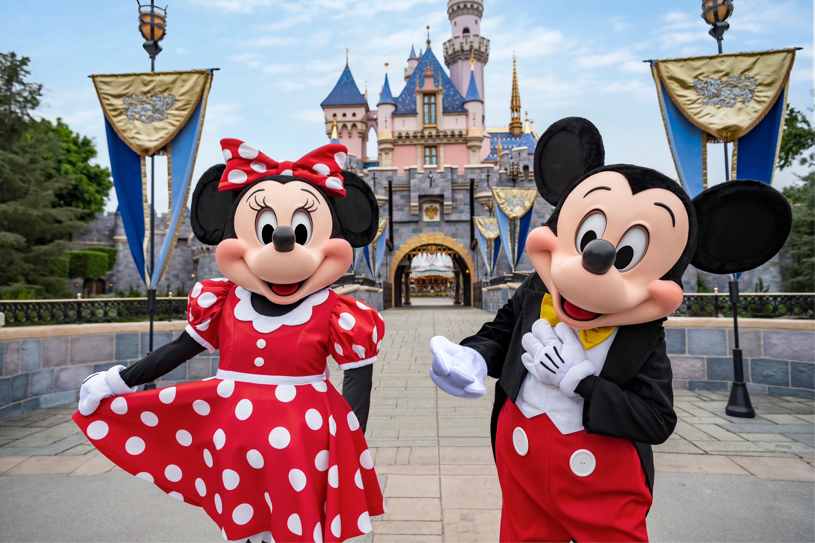 Mickey and Minnie in front of castle at Disneyland