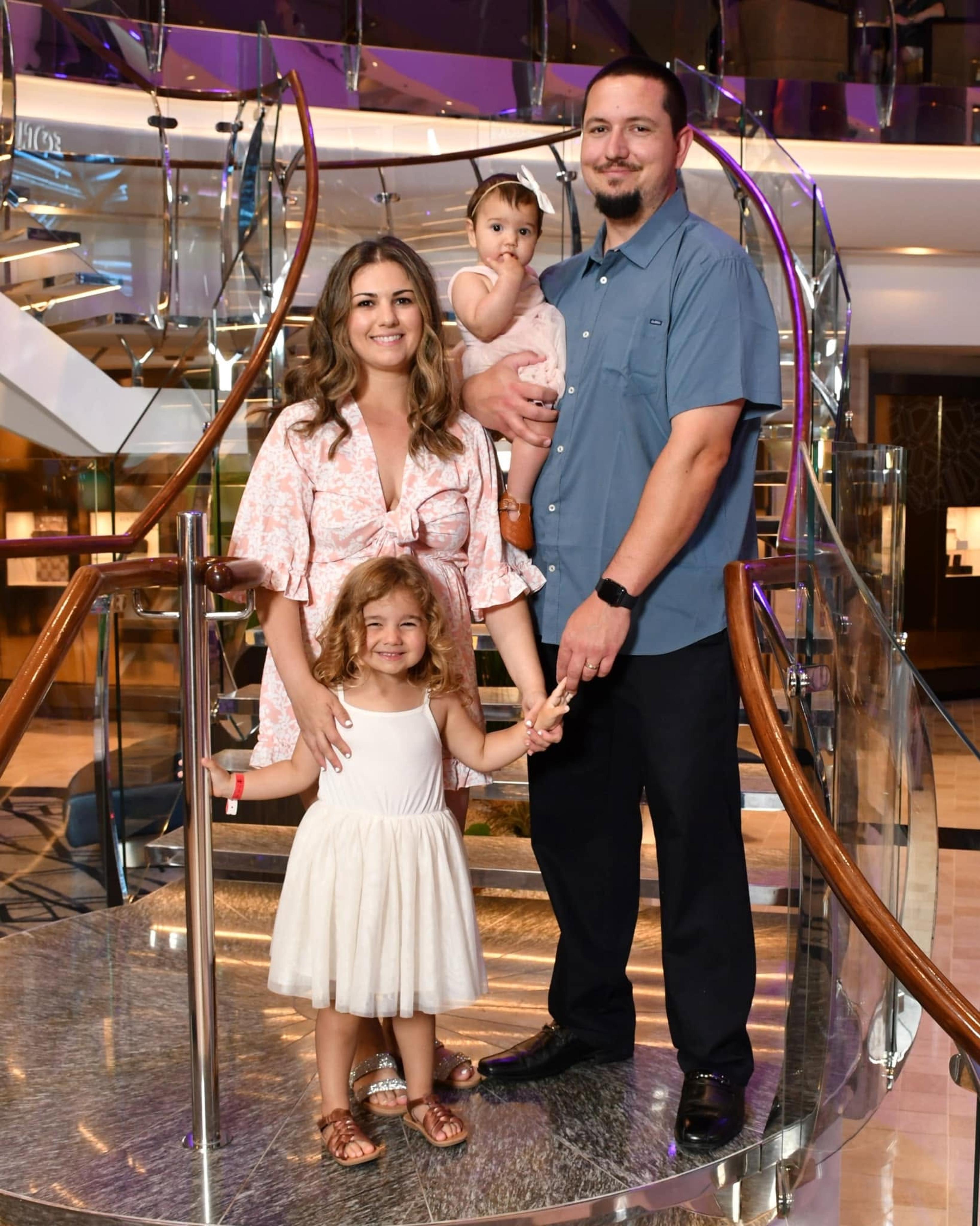 Paige Gold family on cruise ship stairs
