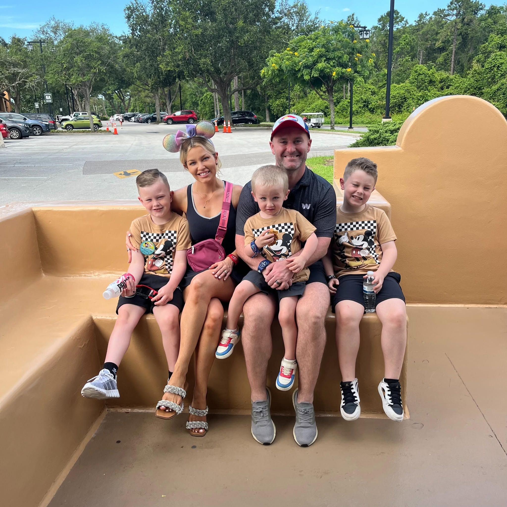 Ashley Mackay family on a bench