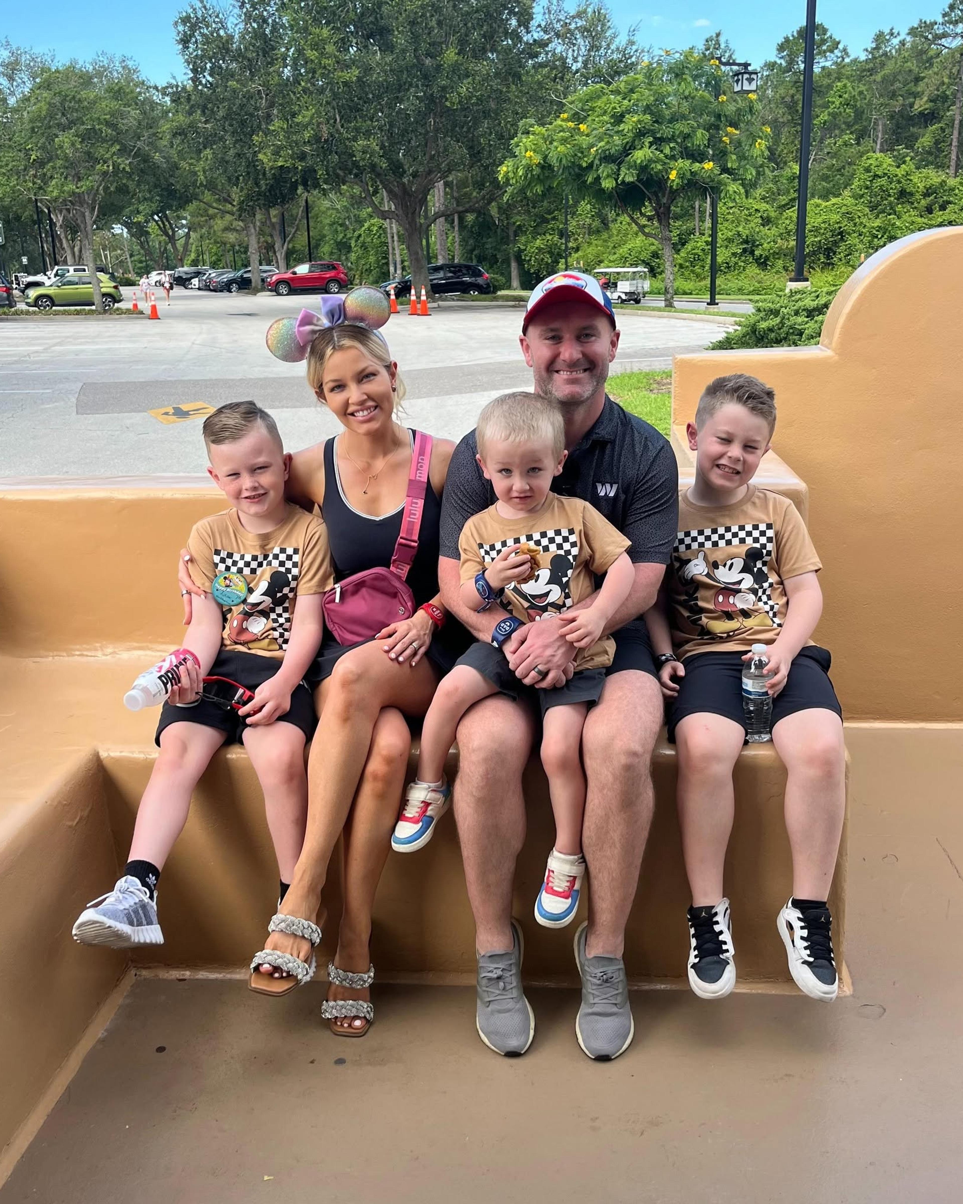 Ashley Mackay family on a bench