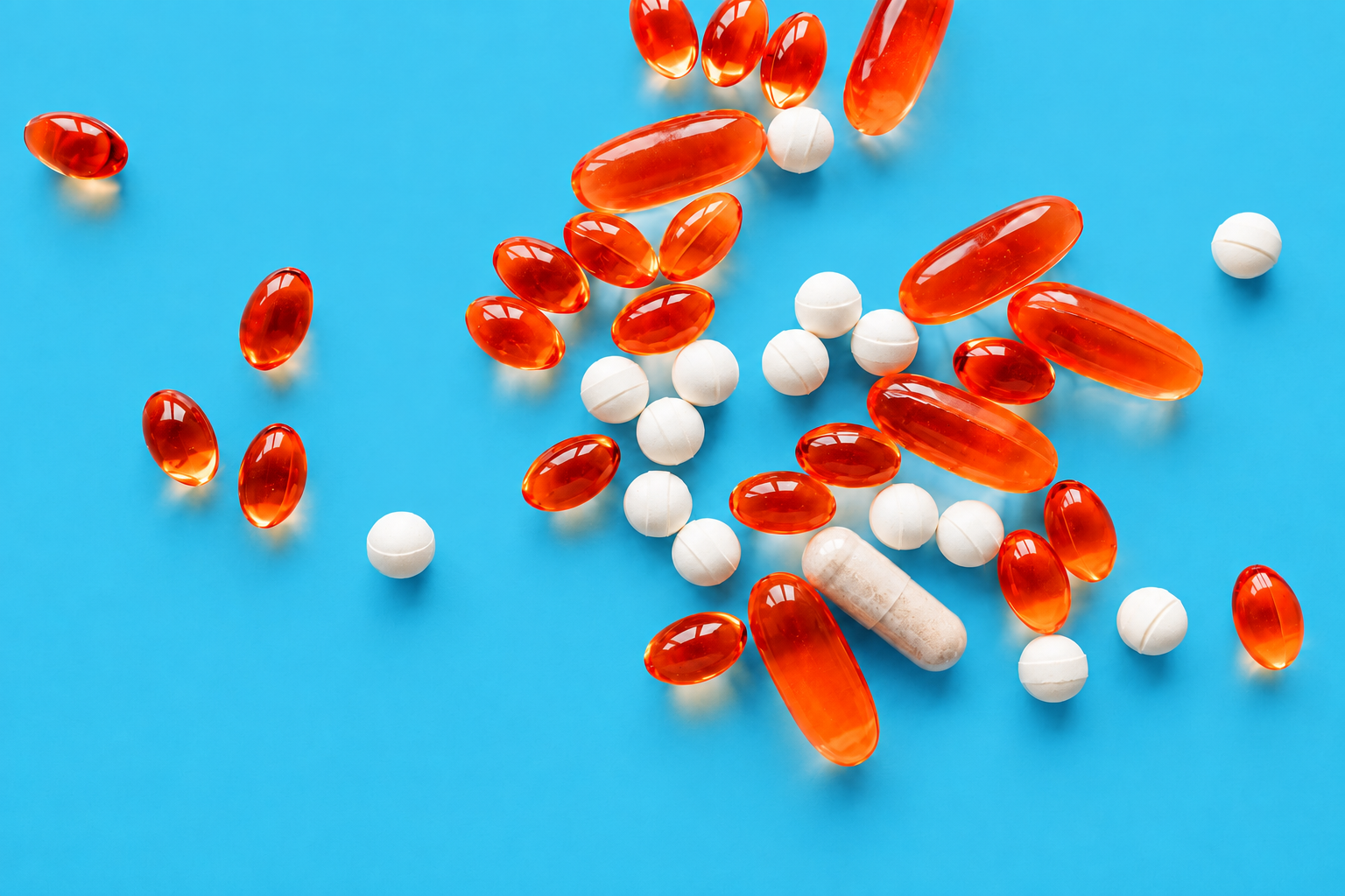 Picture of supplements on a blue background