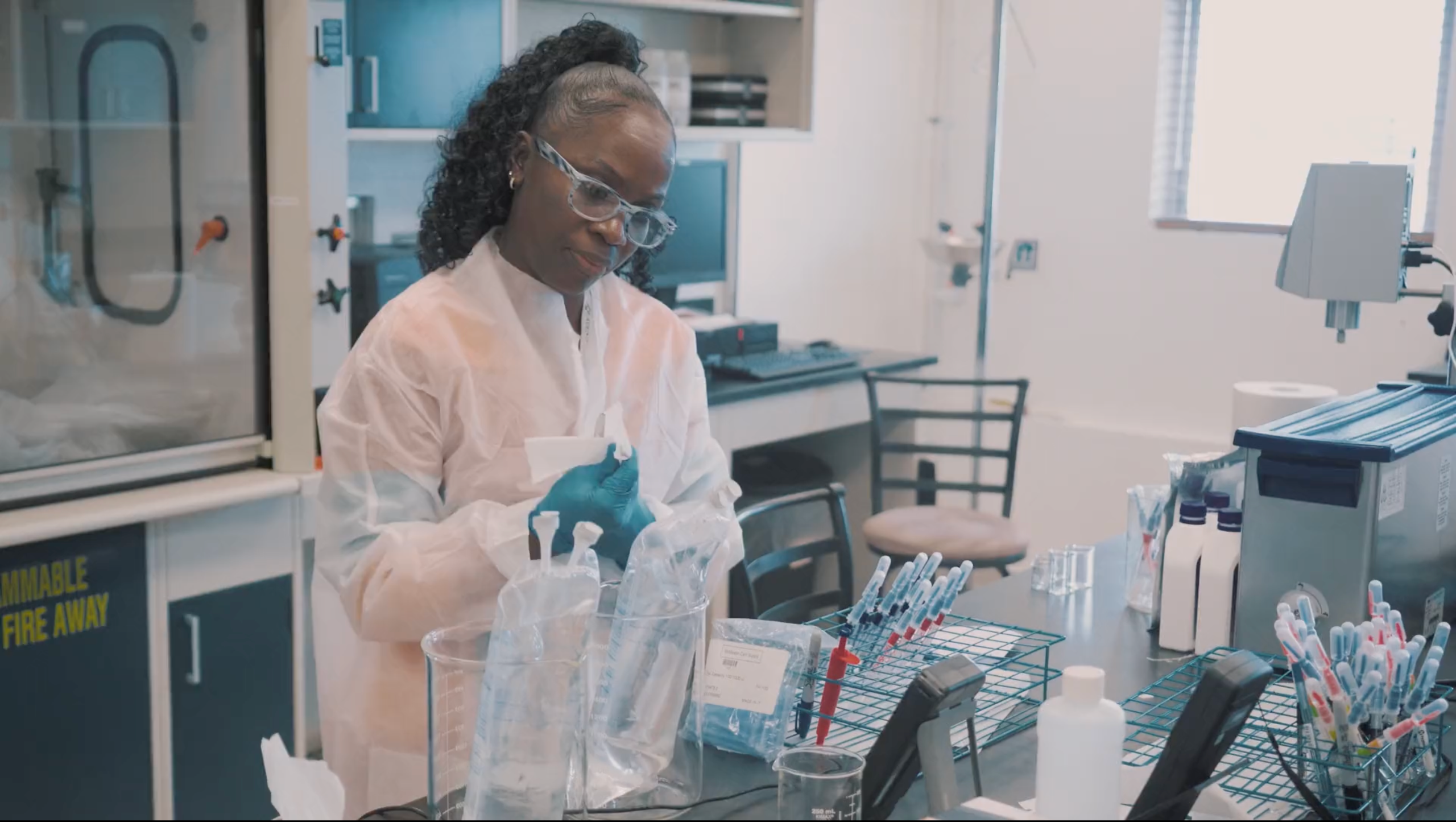 A technician preparing samples in the Bridgetown laboratory