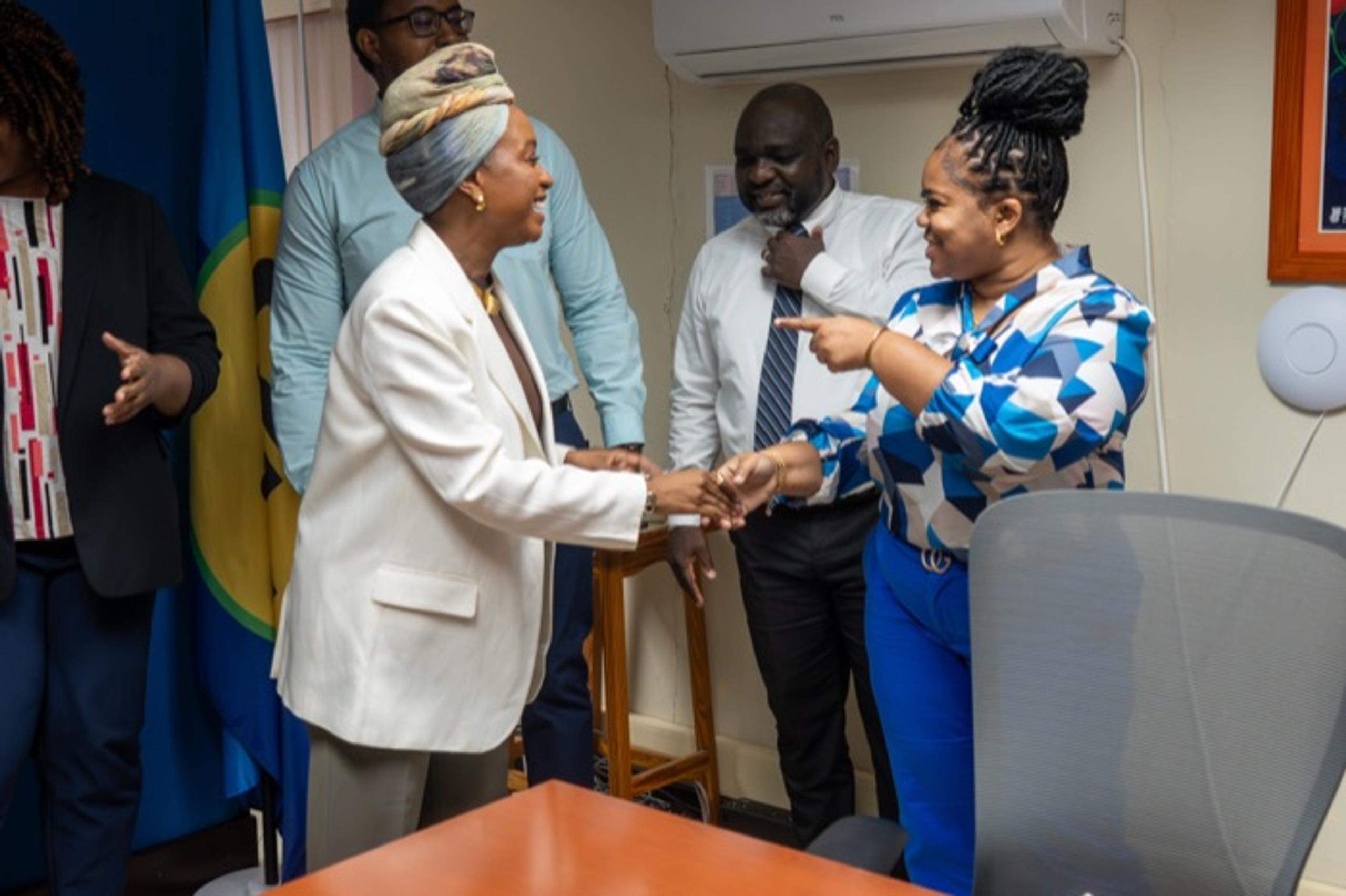 A financing discussion at the Barbados Pharmaceutical Inc. offices
