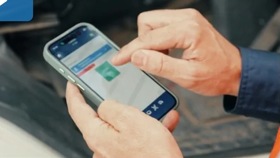 An operator scanning a machine's QR tag with the Fuellox app