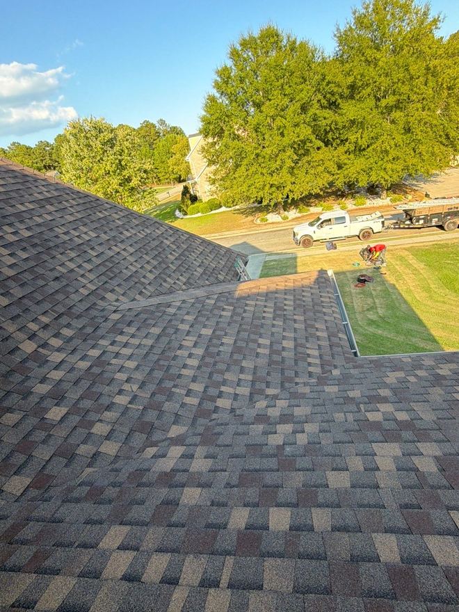 Finished roof looking down on the crew and truck at the kerb