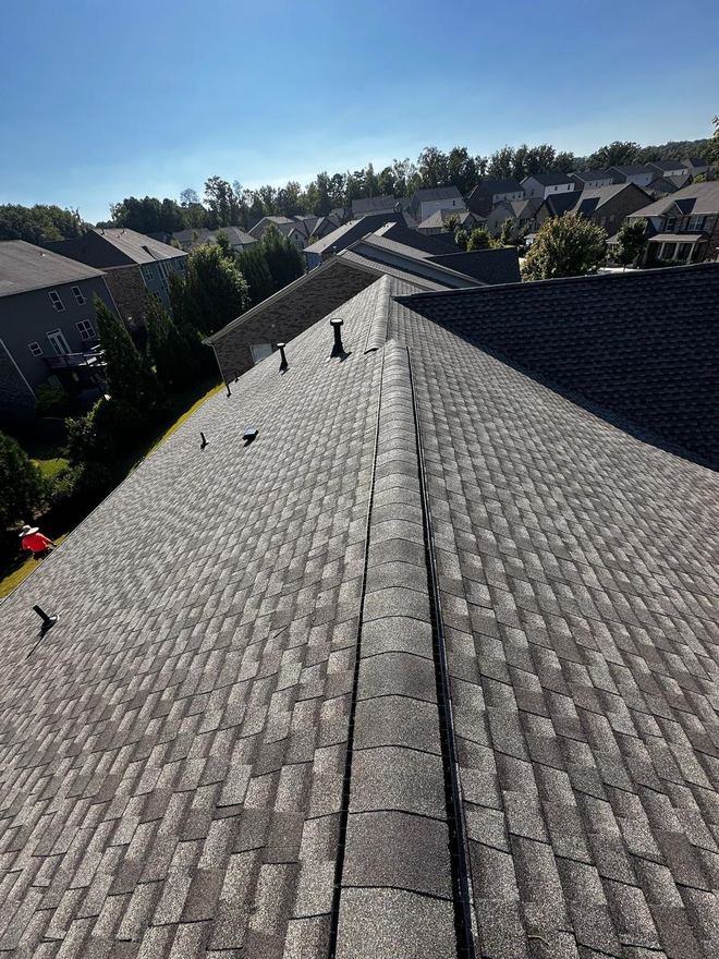 Long ridge line of a new roof above a metro Atlanta subdivision