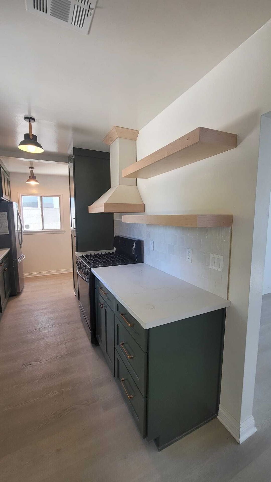 Kitchen And Living Area Opened Into One Space. Kitchen Remodel by Bela Development project photo 3