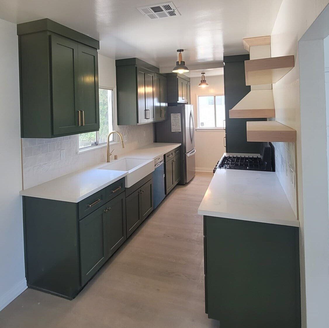 Kitchen And Living Area Opened Into One Space. Kitchen Remodel by Bela Development project photo
