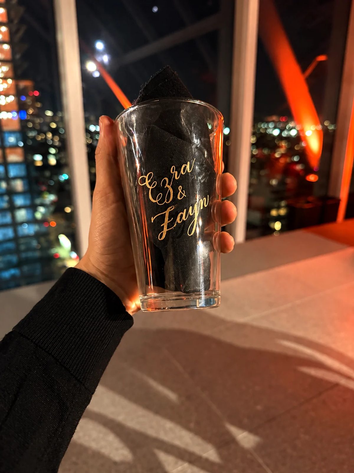 Hand-engraved lettering on a drinking glass