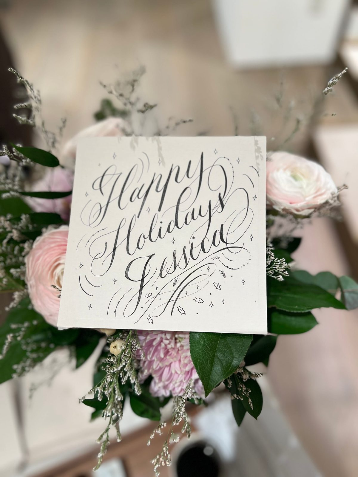 Flourished calligraphy on white paper