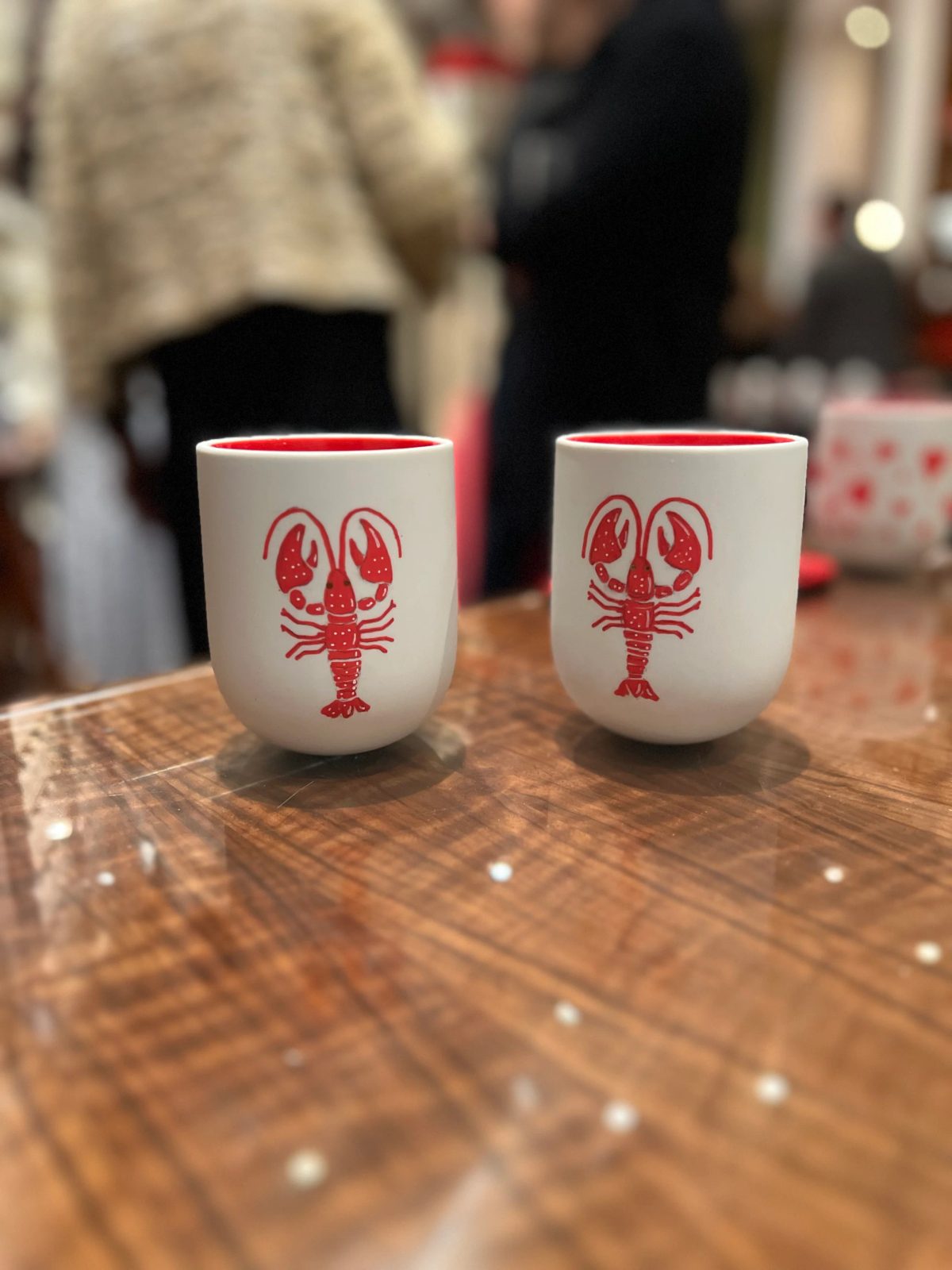 Personalized ceramic cup with hand-drawn lettering or illustration