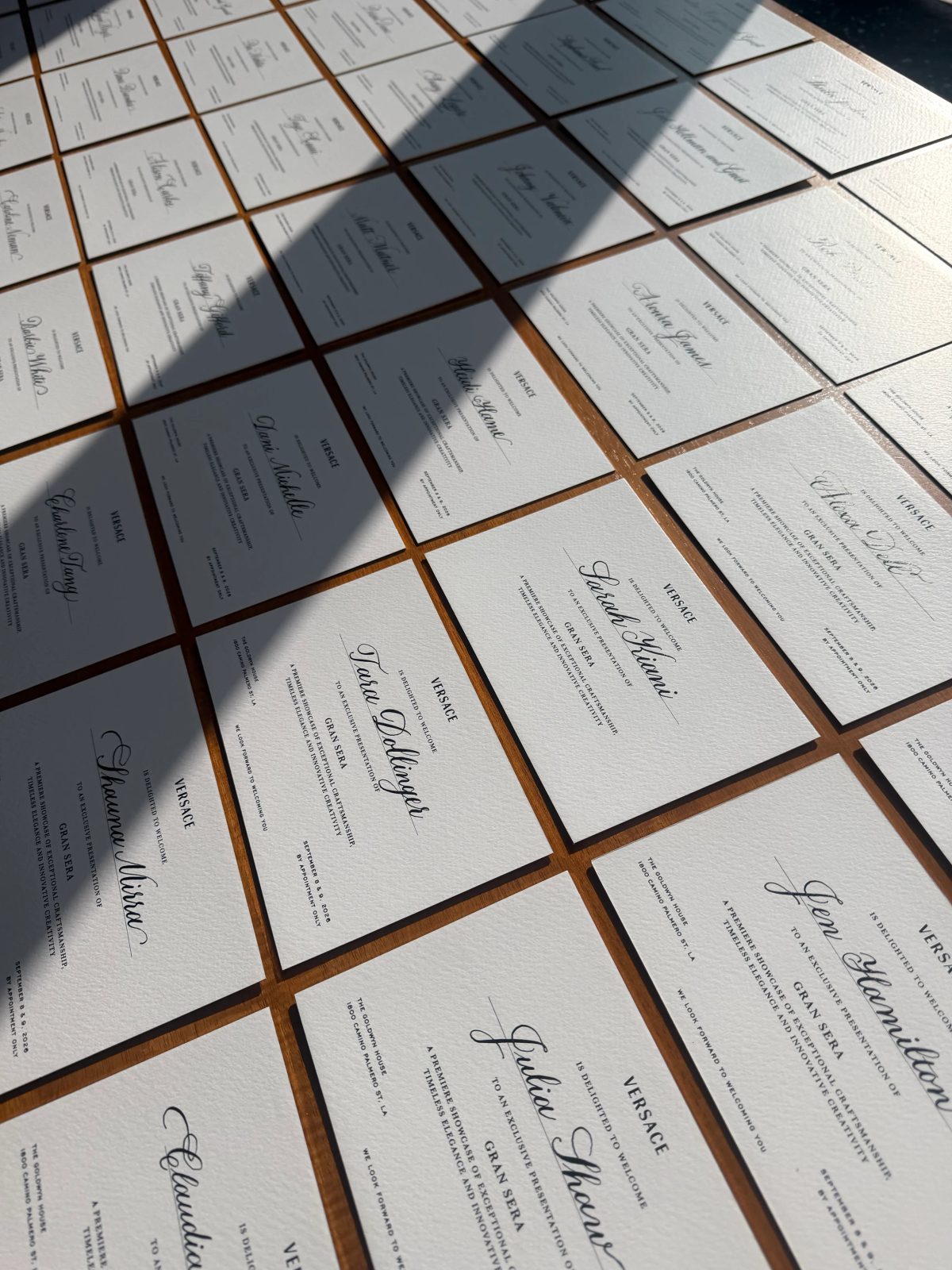 Handwritten cards arranged across a table