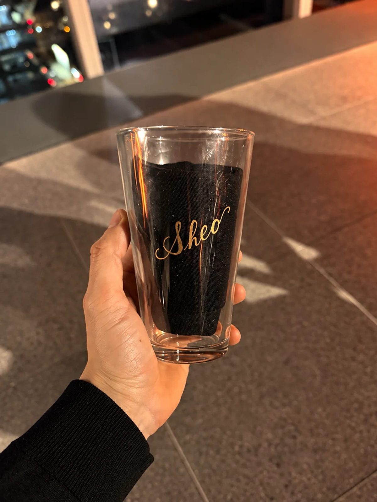 Hand-engraved lettering on a drinking glass