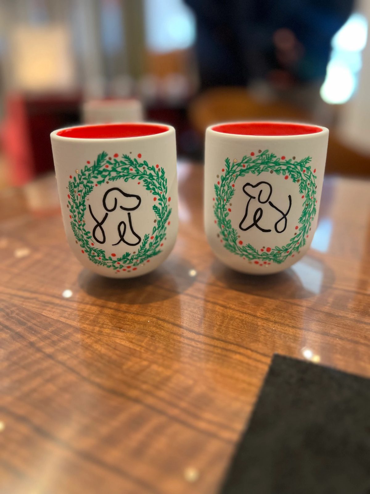 Personalized ceramic cup with hand-drawn lettering or illustration