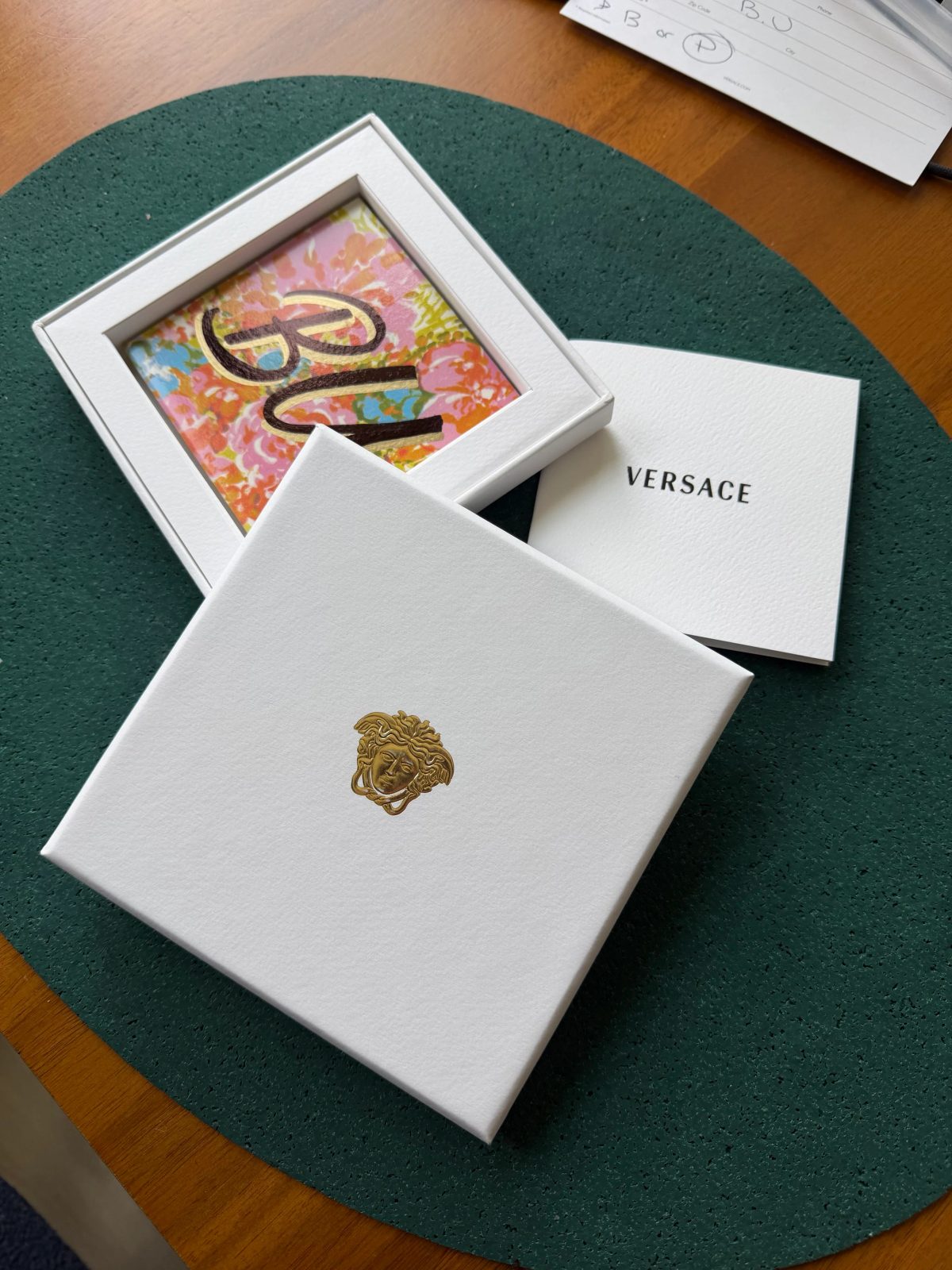 Expressive hand-lettered initials with colorful artwork