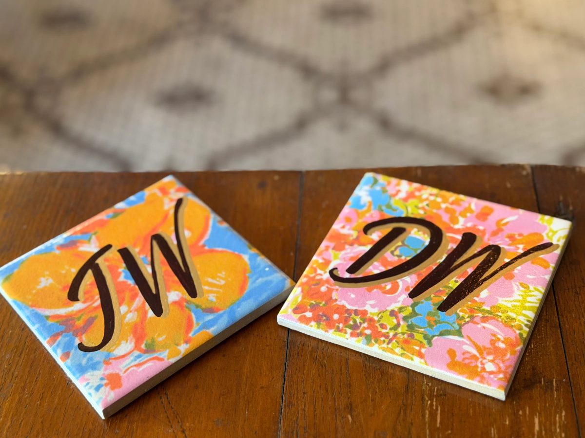 Expressive hand-lettered initials with colorful artwork