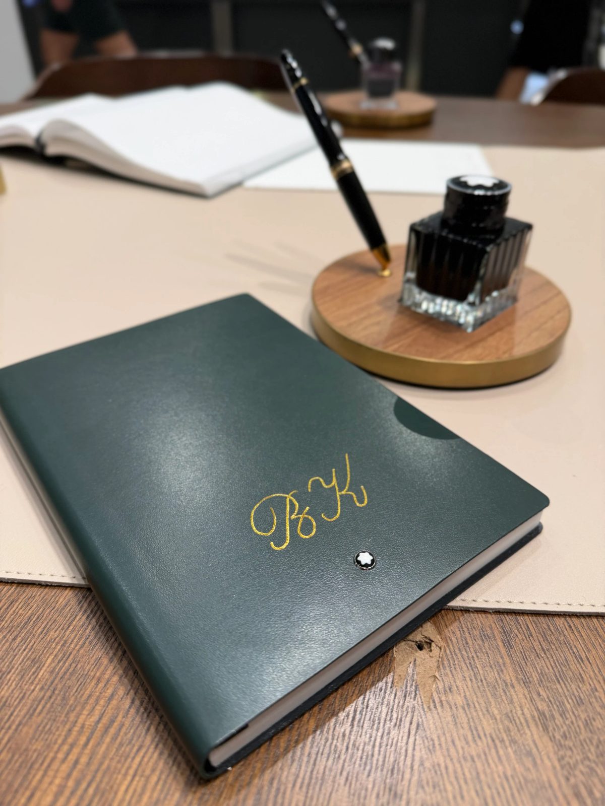 Custom hand lettering on a notebook cover