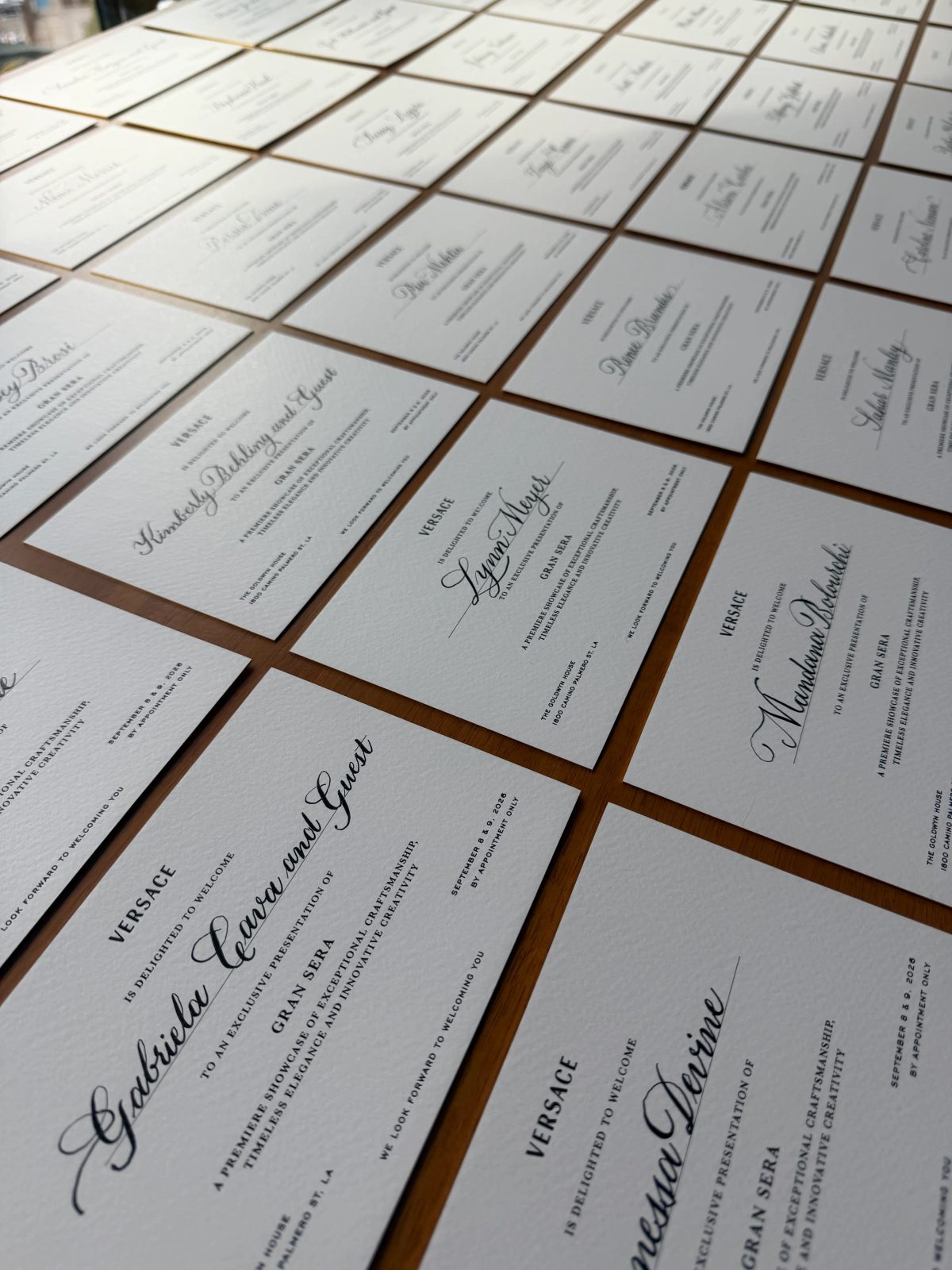 Handwritten cards arranged across a table