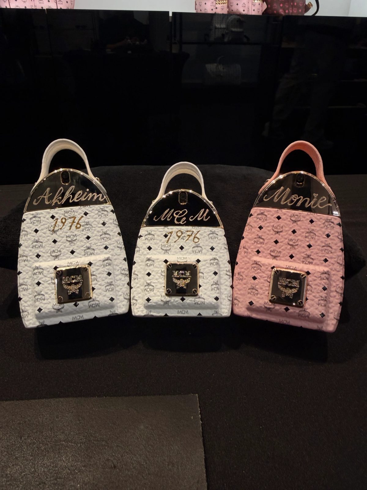 Hand-painted lettering and motifs on leather goods