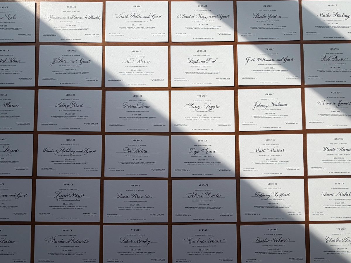 Handwritten cards arranged across a table