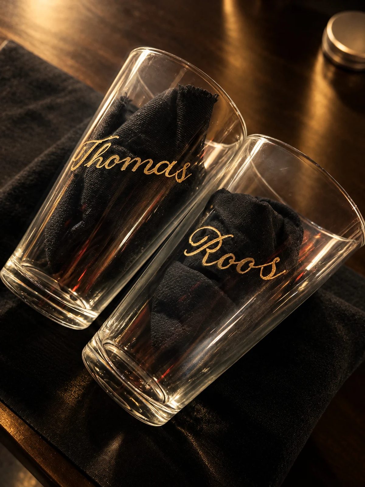 Hand-engraved lettering on a drinking glass