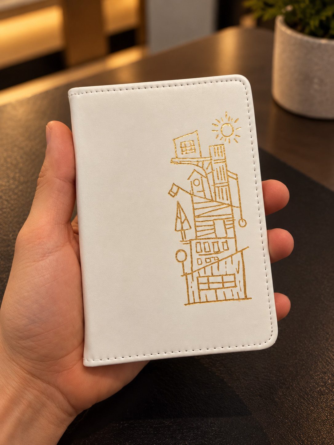Architectural drawing on a small notebook